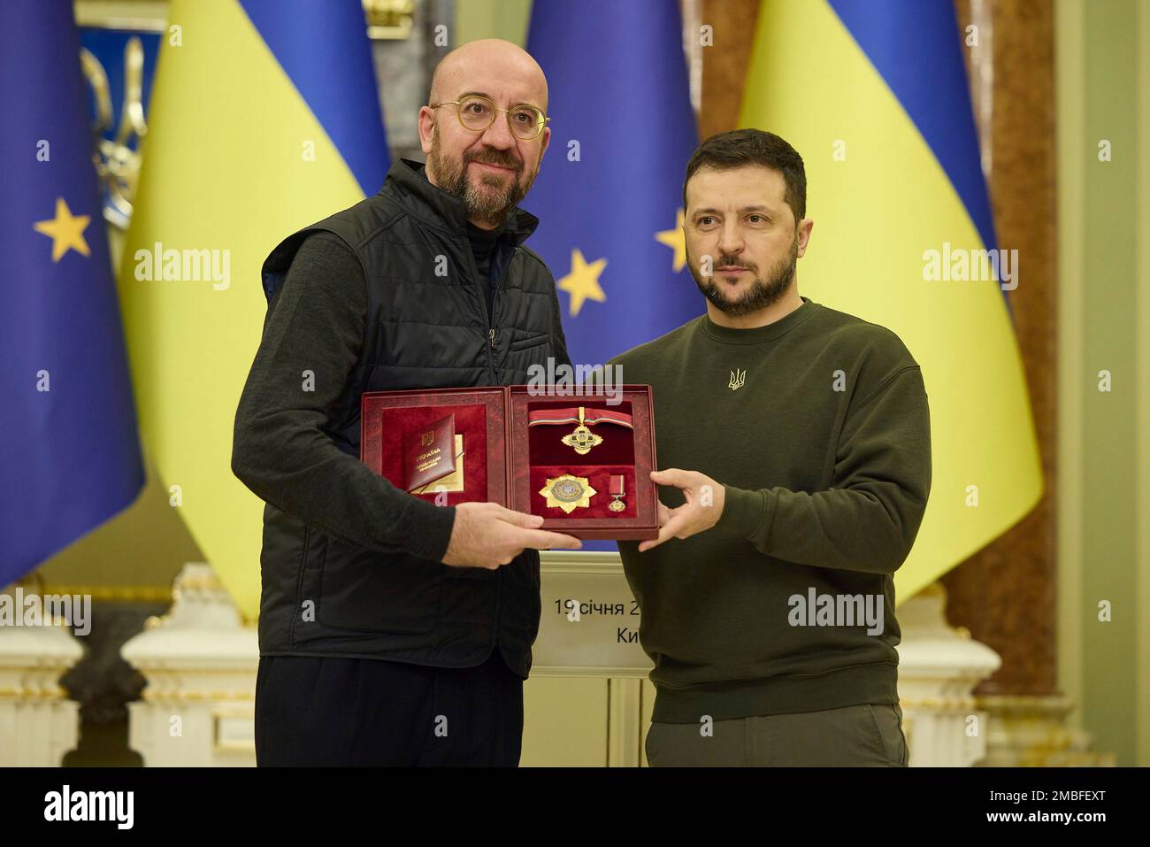 Kyiv, Ukraine. 19th Jan, 2023. Ukrainian President Volodymyr Zelenskyy presents a state award to European Council President Charles Michel, left, during a ceremony at the Mariinskyi Palace, January 19, 2023 in Kiev, Ukraine. Credit: Ukraine Presidency/Ukraine Presidency/Alamy Live News Stock Photo