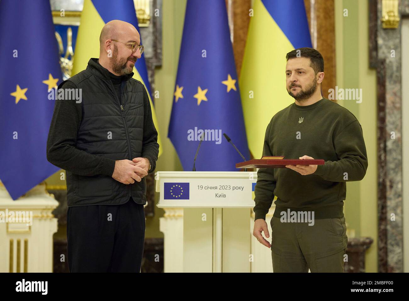 Kyiv, Ukraine. 19th Jan, 2023. Ukrainian President Volodymyr Zelenskyy presents a state award to European Council President Charles Michel, left, during a ceremony at the Mariinskyi Palace, January 19, 2023 in Kiev, Ukraine. Credit: Ukraine Presidency/Ukraine Presidency/Alamy Live News Stock Photo