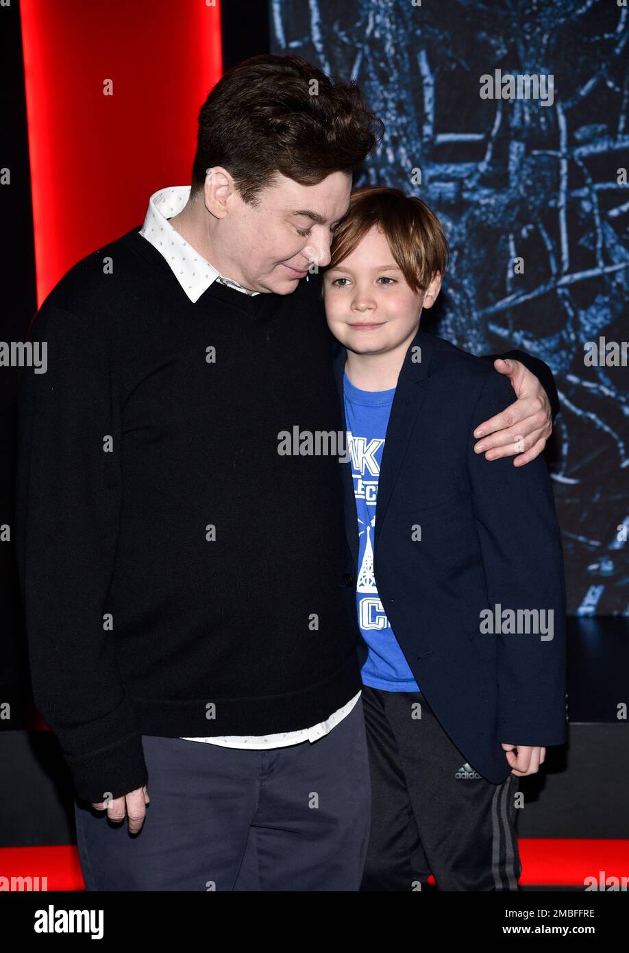 Mike Myers, left, and son Spike Myers attend the premiere of "Stranger(01)