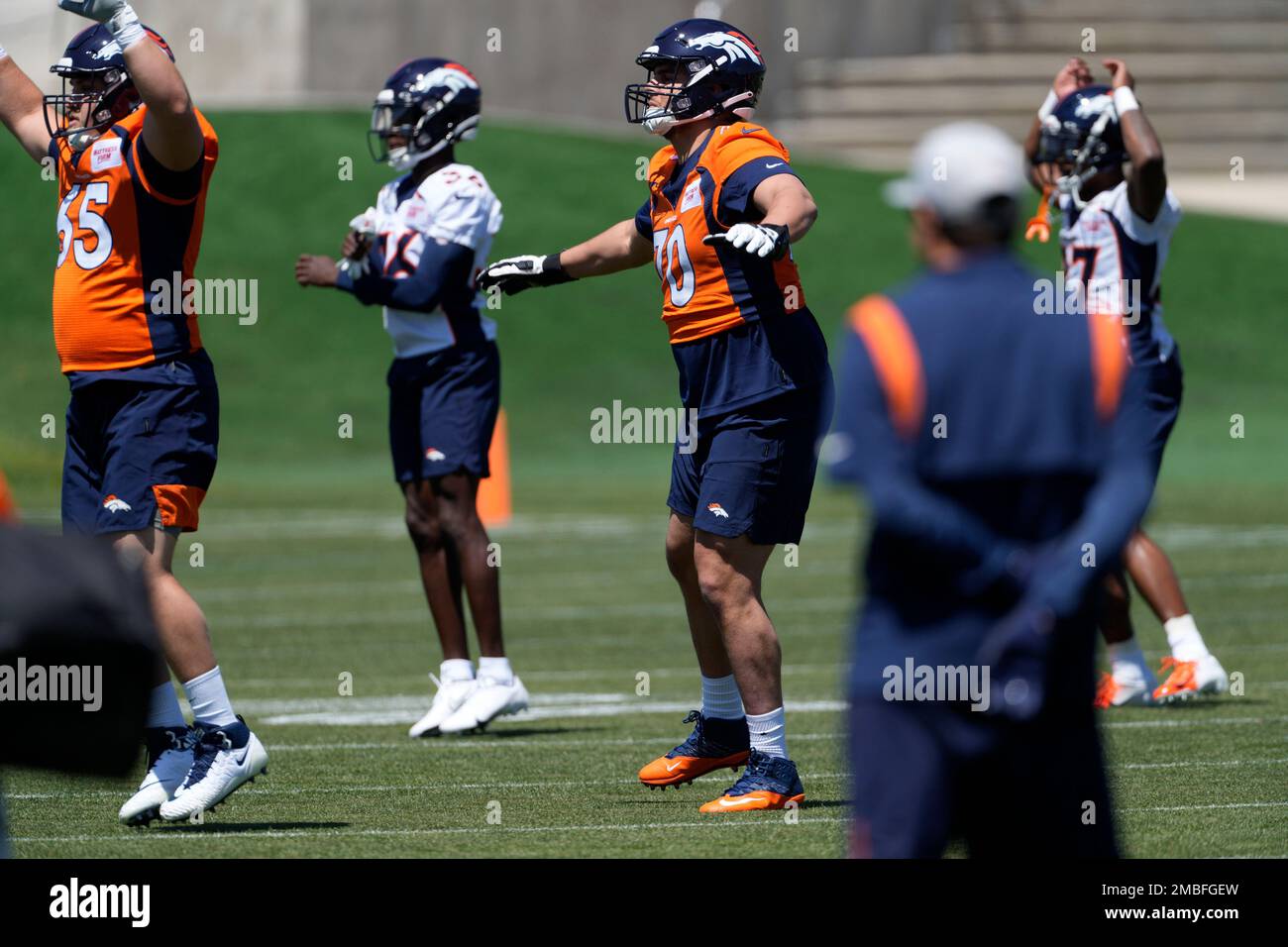 Denver Broncos tackle Sebastian Gutierrez takes part in drills