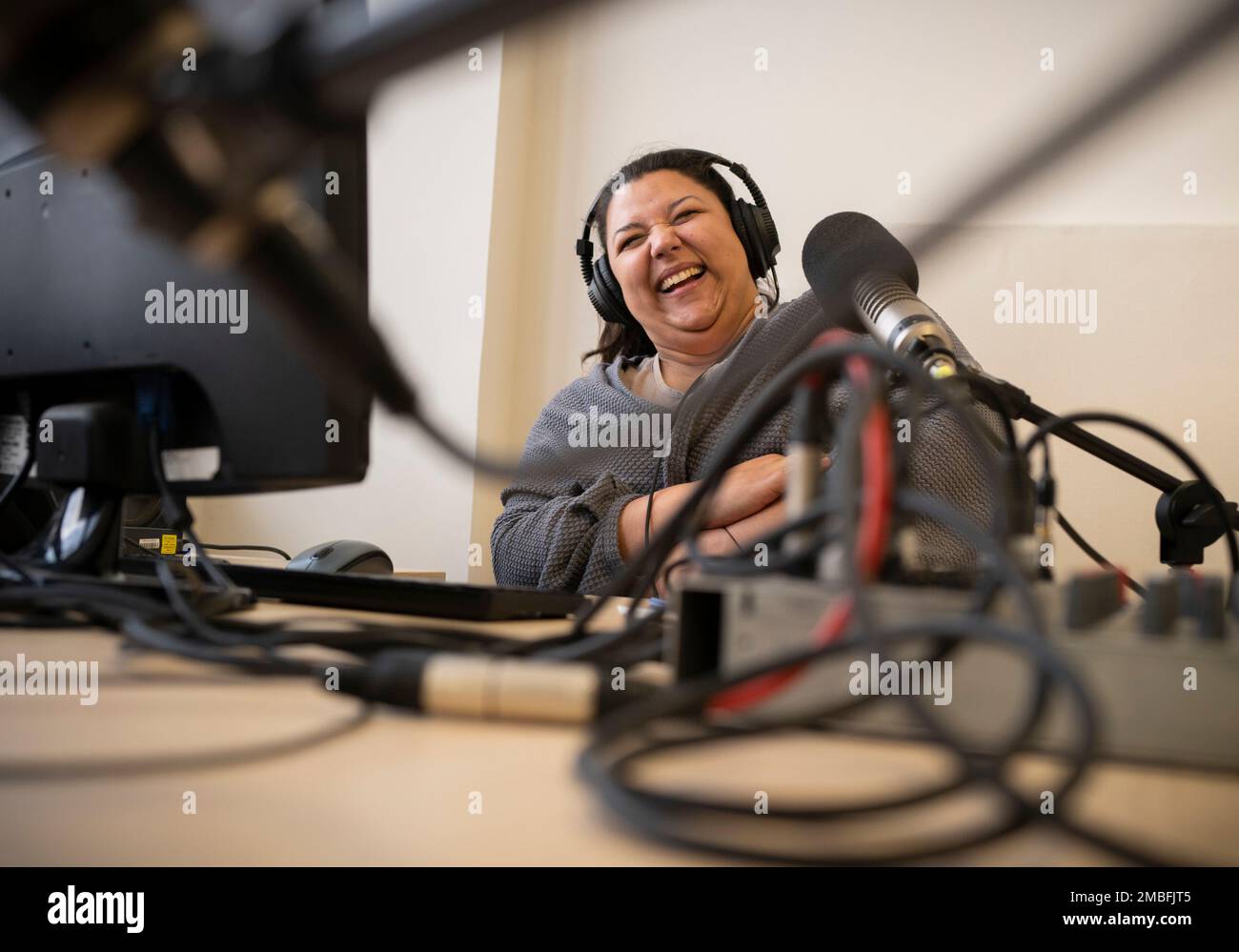 Bettina Pocsai, co-host of Radio Dikh's women's show 'Our Voice' works in a  radio studio in Budapest, Hungary, Friday May 6, 2022. Intellectuals,  broadcasters and cultural figures from Hungary's Roma community have