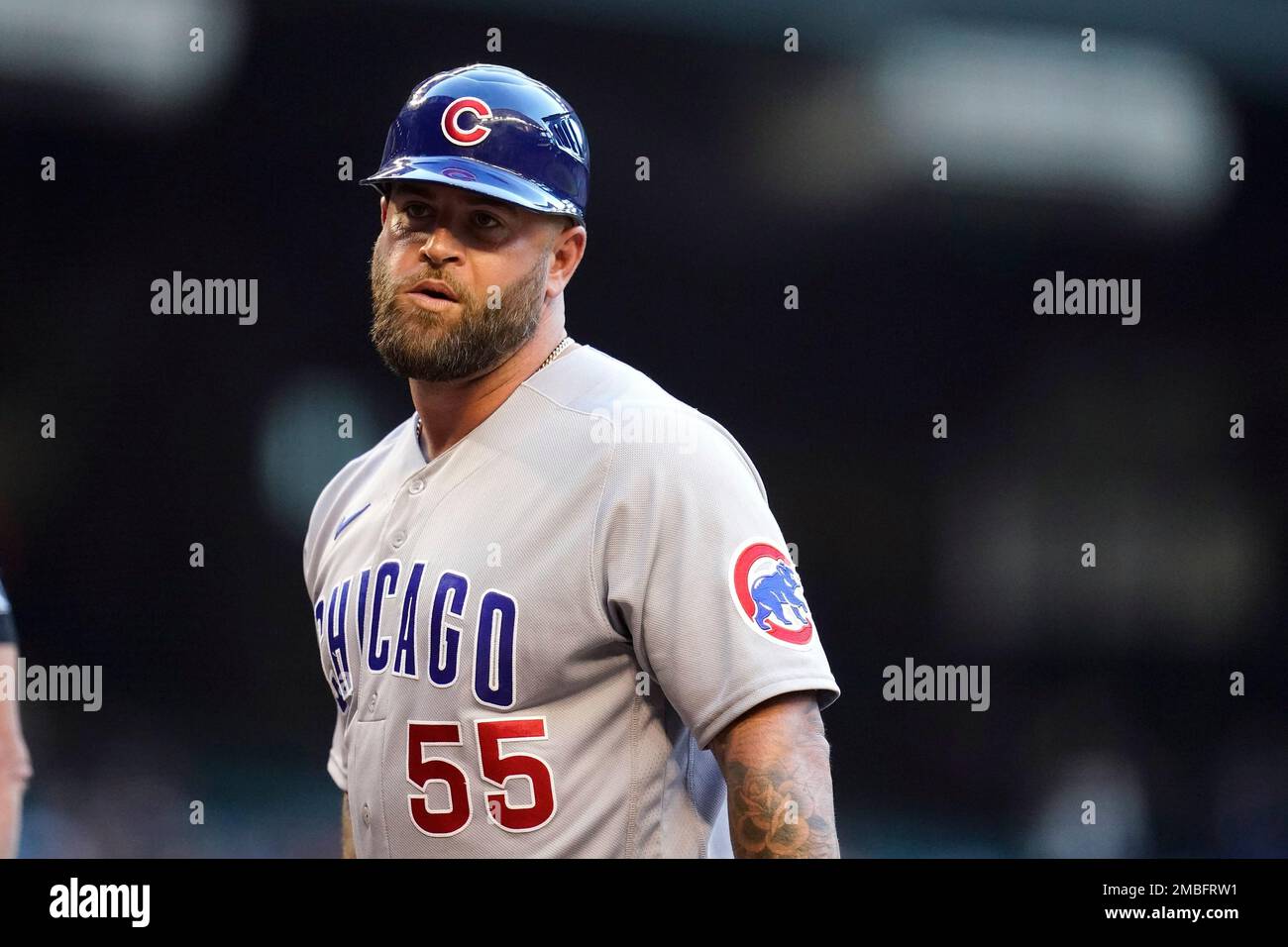 Chicago Cubs first base coach Mike Napoli paues on the field prior to a  baseball game against the Arizona Diamondbacks Friday, May 13, 2022, in  Phoenix. (AP Photo/Ross D. Franklin Stock Photo 