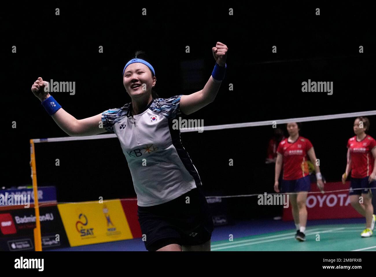 South Koreas Shin Seung-chan, left, reacts after winning over Chinas Jia Yi Fan, and Chen Qing Chen during their womens double final badminton match at Thomas and Uber Cup in Bangkok, Thailand,