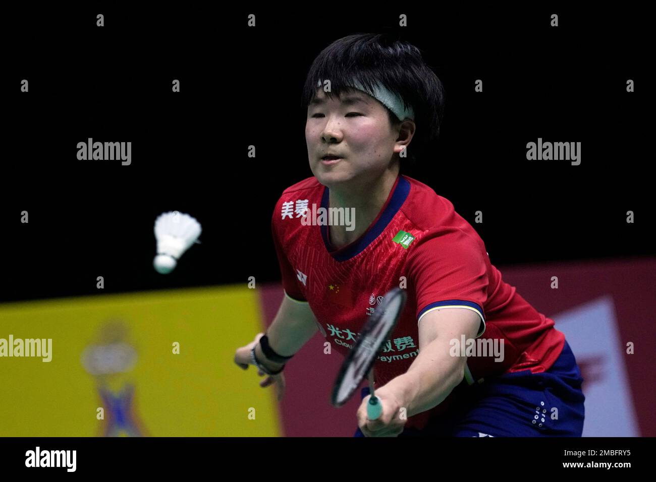 South Koreas Kim Ga-eun returns a shot to Chinas He Bing Jiao during their womens singles final badminton match at Thomas and Uber Cup in Bangkok, Thailand, Saturday, May 14 , 2022