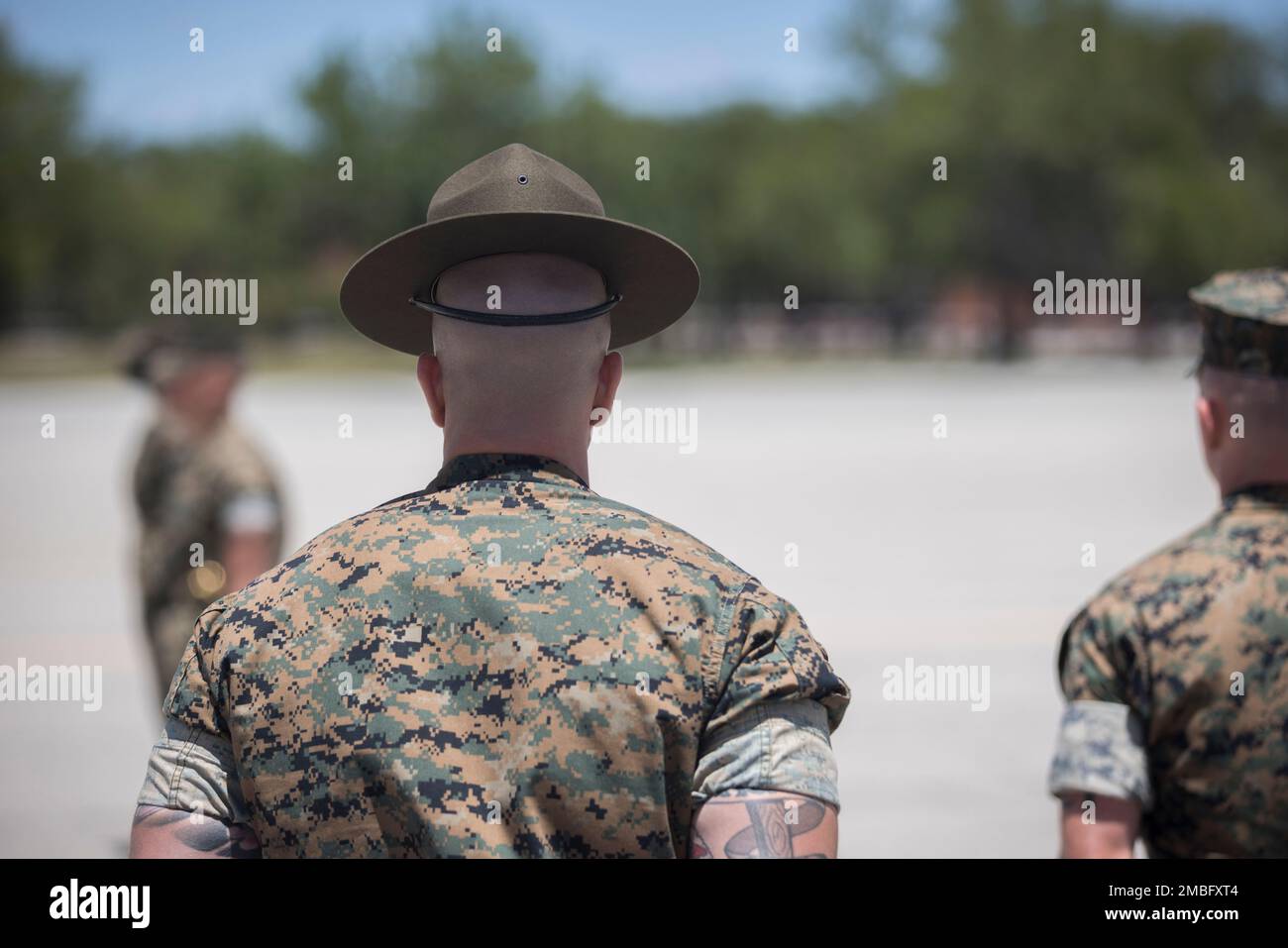 A U.S. Marine Corps drill instructor teaches a group of Marines at ...