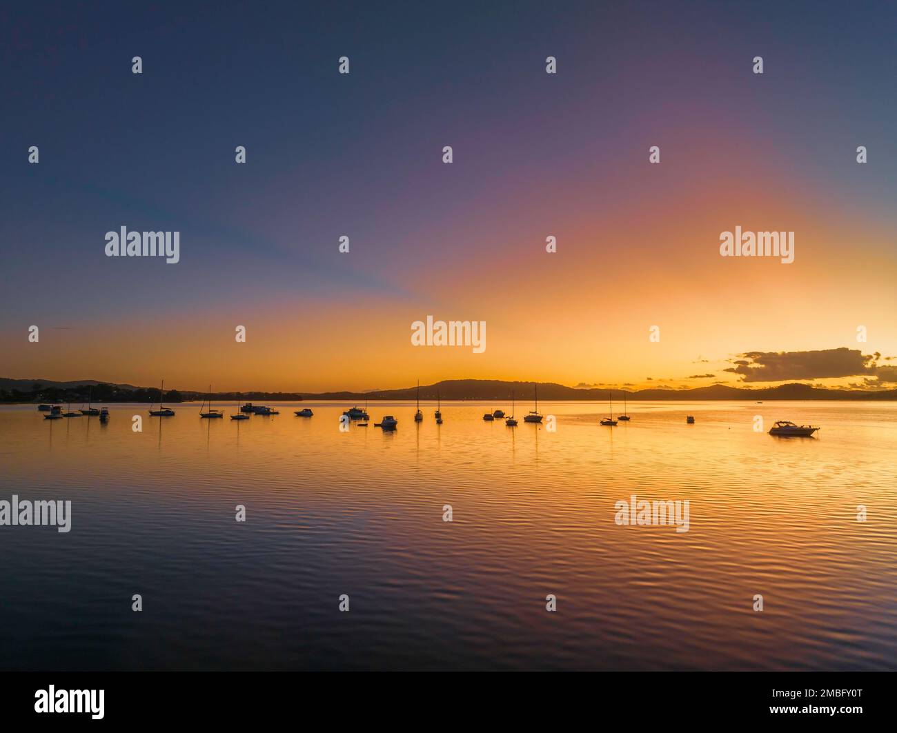 Sunrise over Brisbane Water at Koolewong and Tascott on the Central Coast, NSW, Australia. Stock Photo