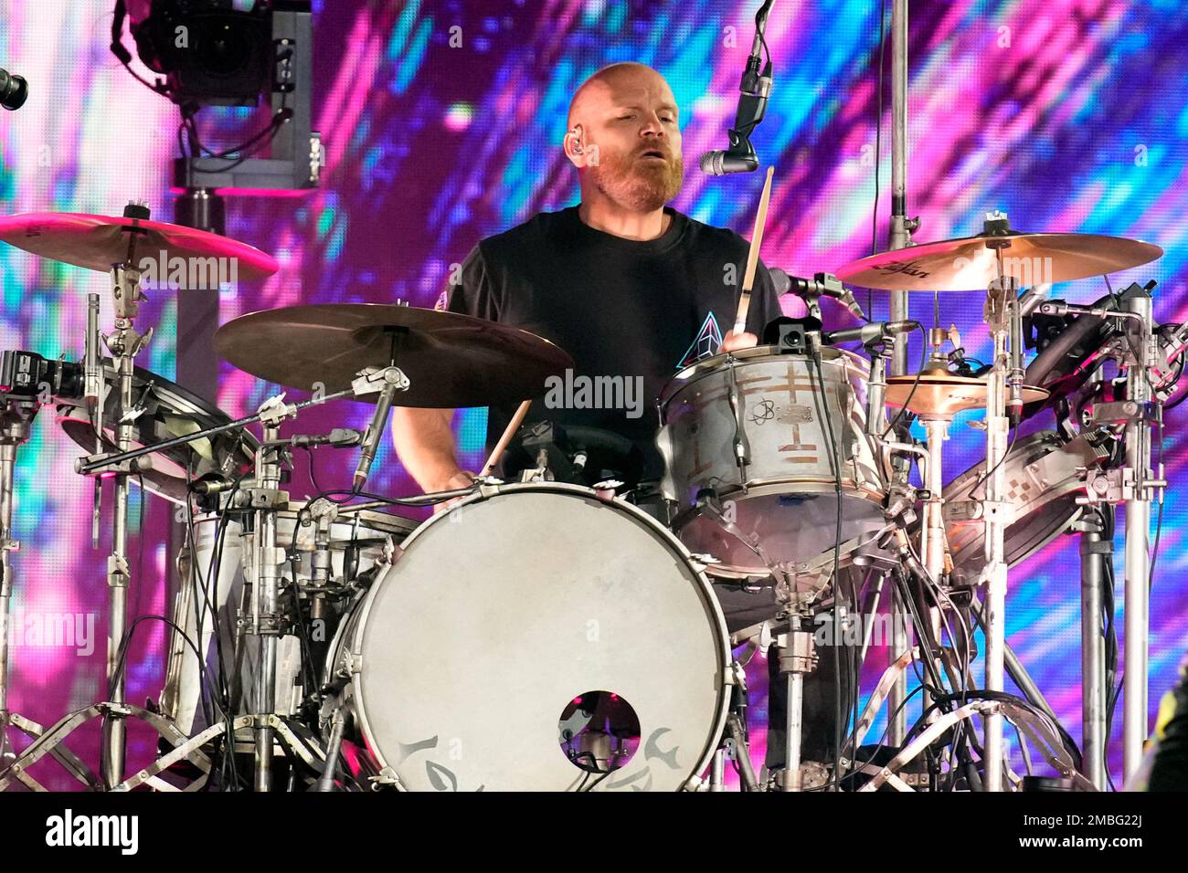 Will Champion of Coldplay, performs during the band's Music of the Spheres  world tour on Thursday, May 12, 2022, at State Farm Stadium in Glendale,  Ariz. (Photo by Rick Scuteri/Invision/AP Stock Photo 