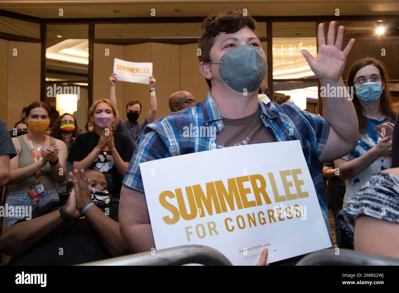 The crowd cheers in support of state Rep. Summer Lee, who is seeking the  Democratic Party nomination for Pennsylvania's 12th District .  Congressional district, during a campaign event where Sen. Bernie Sanders,