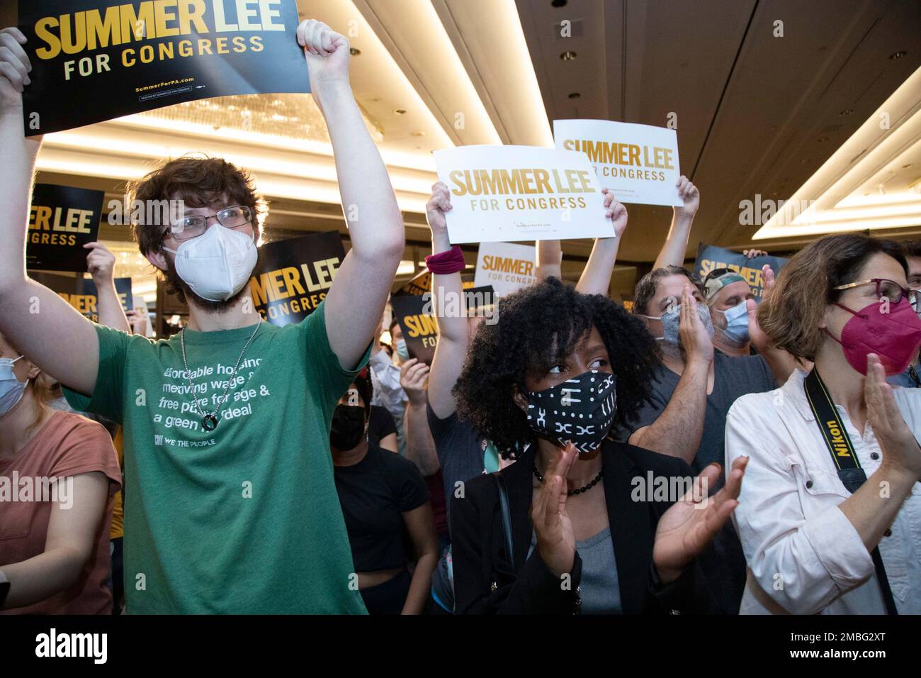 The crowd cheers in support of state Rep. Summer Lee, who is seeking the  Democratic Party nomination for Pennsylvania's 12th District .  Congressional district, during a campaign event where Sen. Bernie Sanders,