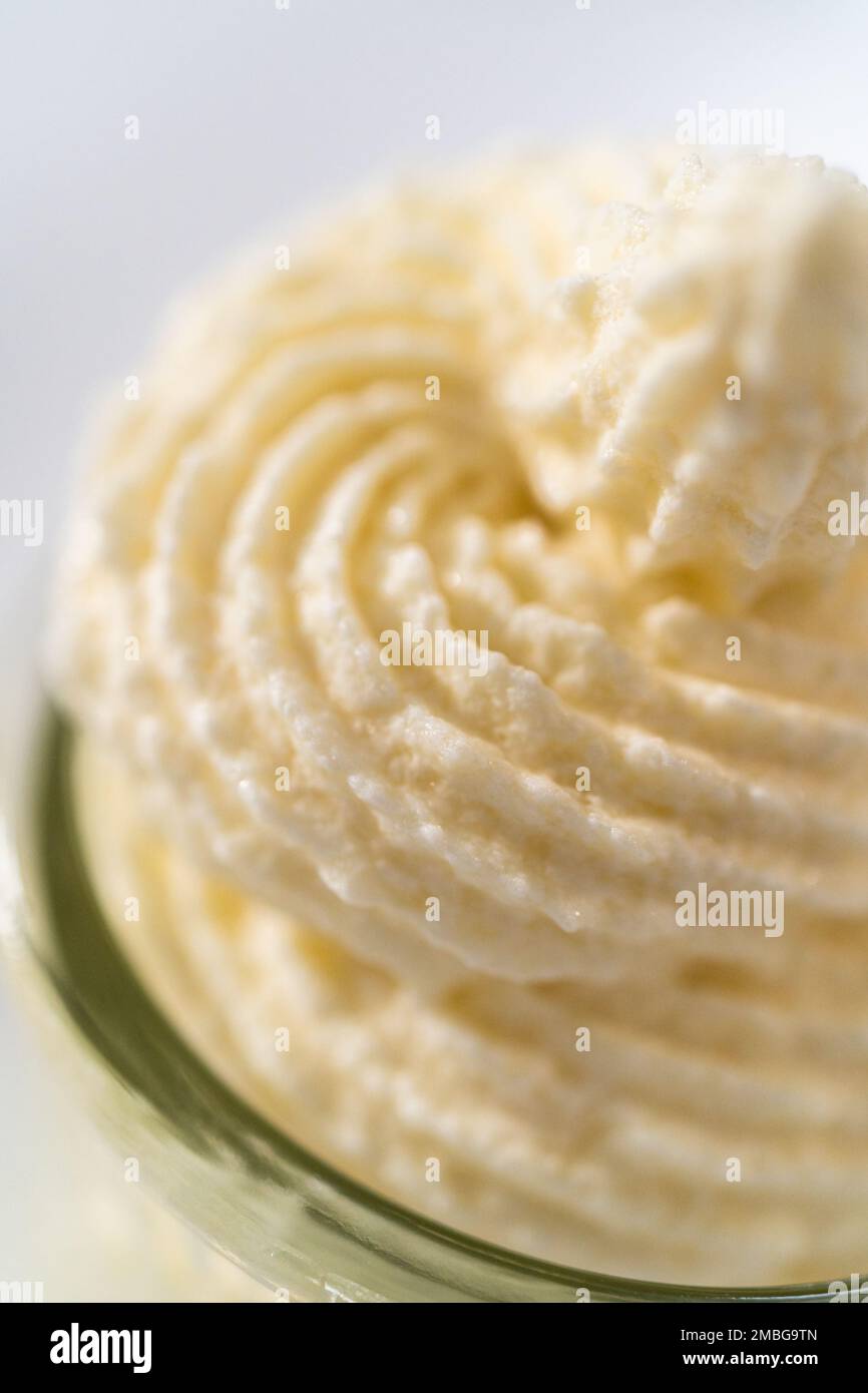 White chocolate ganache frosting Stock Photo Alamy