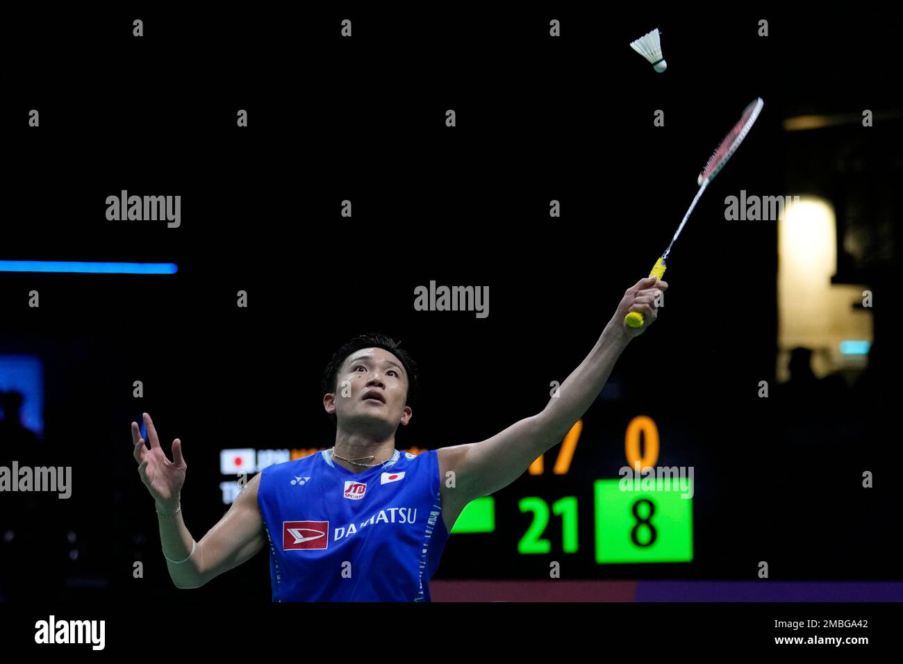 Japans Kento Momota returns a shot to Malaysias Lee Zii Jia during their mens singles qualifying match at Thomas and Uber Cup in Bangkok, Thailand, Wednesday, May 11, 2022