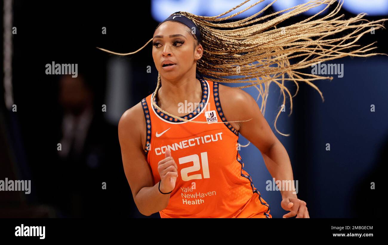 Connecticut Sun guard/forward DiJonai Carrington (21) defends against the  New York Liberty in the second half during a WNBA basketball game,  Saturday, May 7, 2022, in New York. The Liberty won 81-79. (