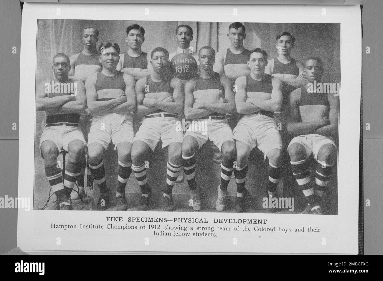 Fine specimen- physical development; Hampton Institute champions of 1912, showing a strong team of the colored boys and their Indian fellow students, 1917. Stock Photo