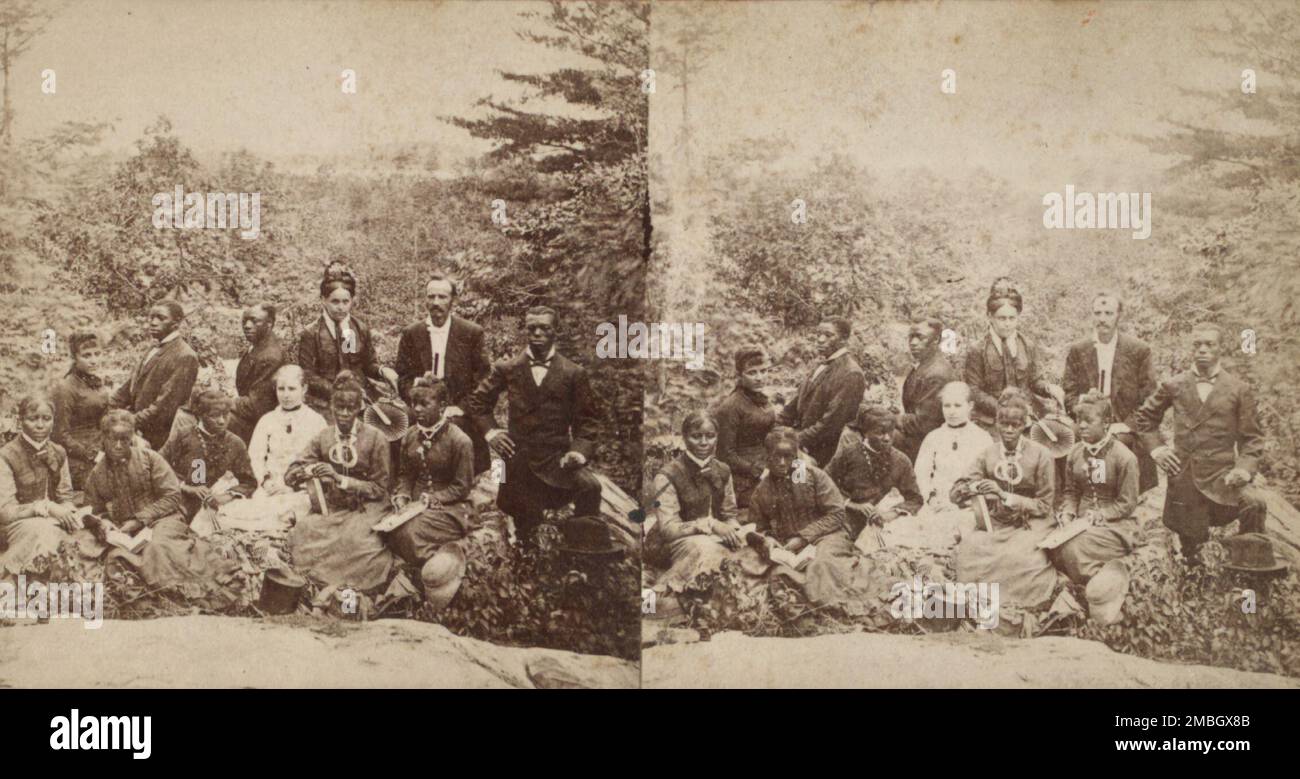 Group of tourists, some African American, c1850-c1930. Stock Photo