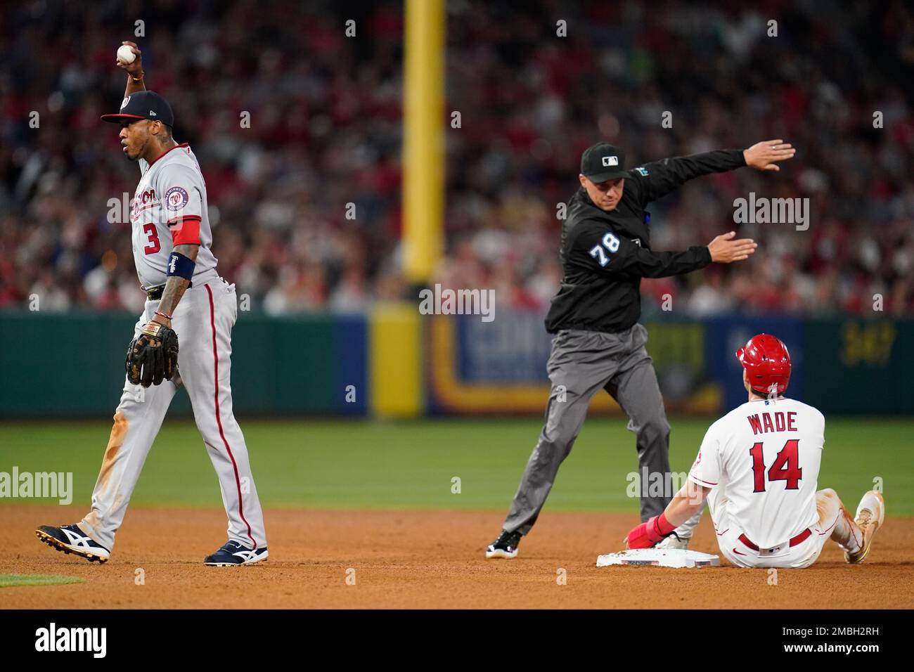 Los Angeles Angels' Tyler Wade (14) reacts after being caught stealing ...