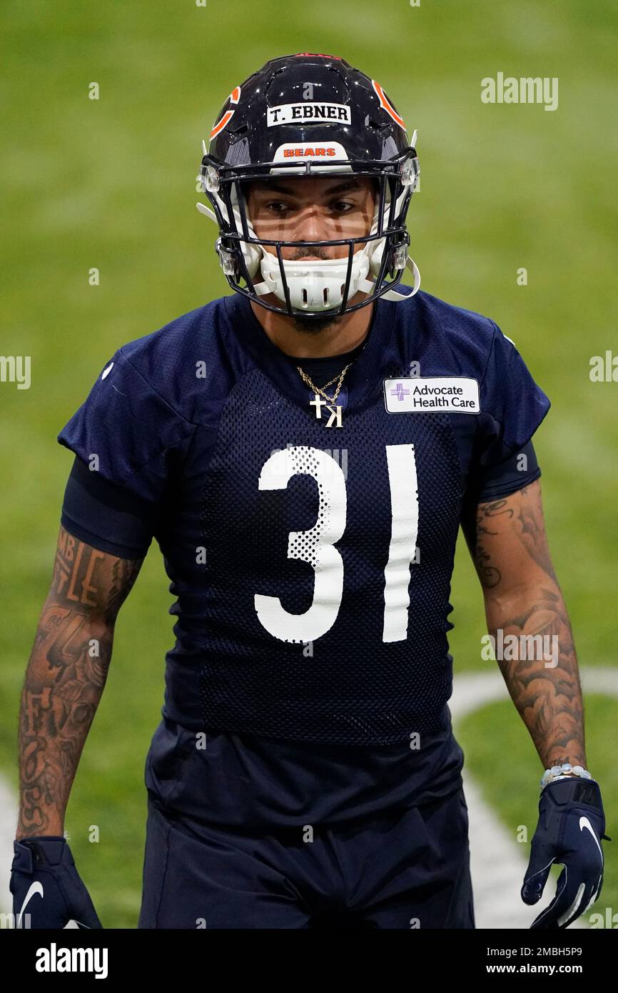 Chicago Bears running back Tristan Ebner warms up with teammates during the  NFL football team's rookie minicamp at Halas Hall in Lake Forest, Ill.,  Friday, May 6, 2022. (AP Photo/Nam Y. Huh