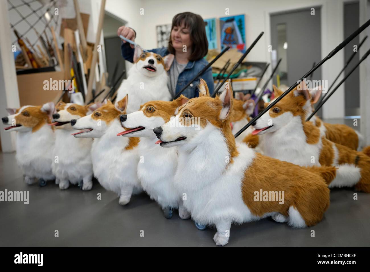 Puppet maker Louise Jones puts the finishing touches to her group of