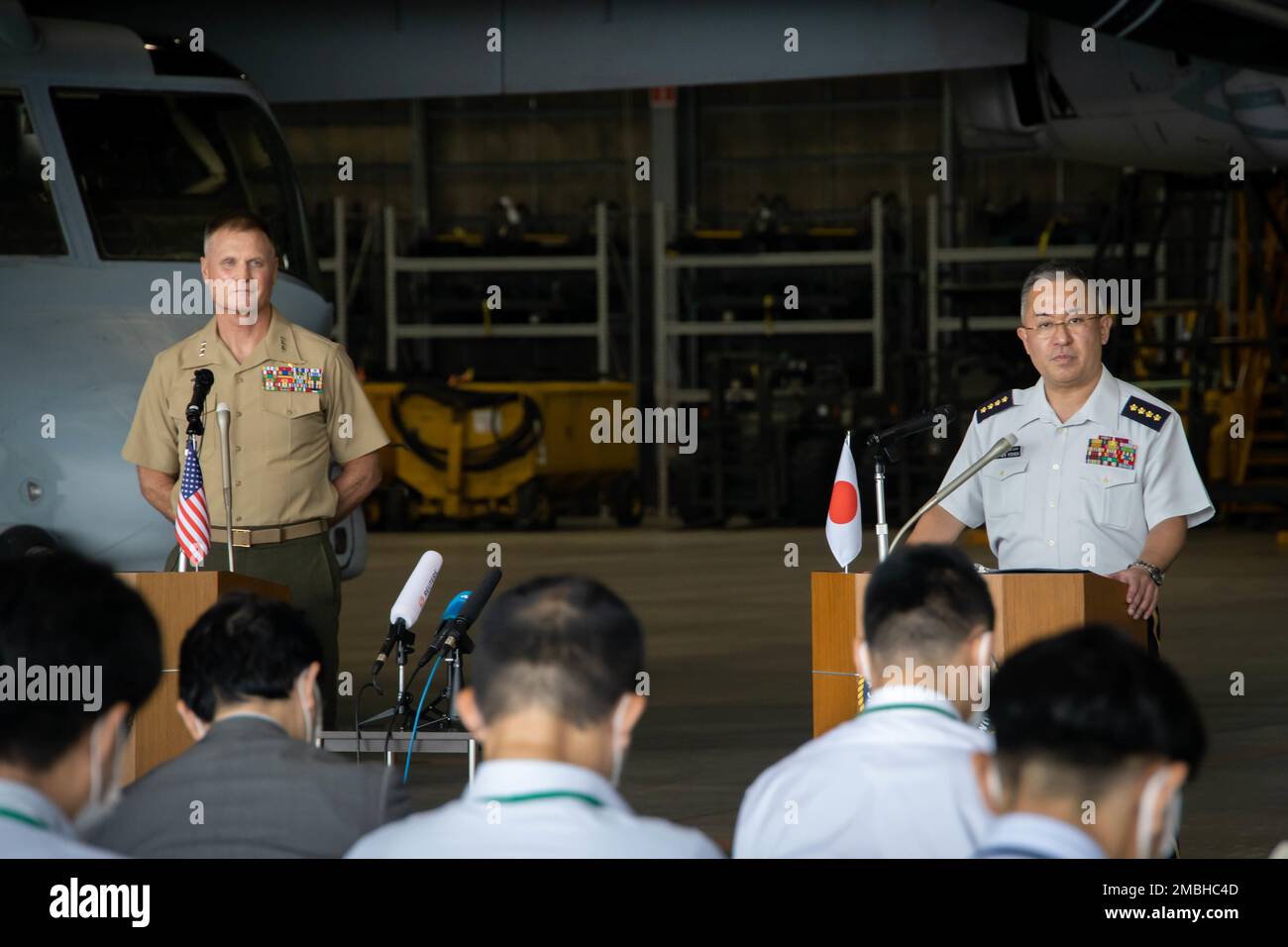 U.S. Marine Corps Lt. Gen. Steven R. Rudder, left, commander, U.S. Marine Corps Forces, Pacific, and Japan Ground Self-Defense Force Gen. Yoshida, chief of staff, answer questions during a press conference for the Pacific Amphibious Leaders Symposium, Camp Kisarazu, Japan, June 16, 2022. This iteration of PALS brought senior leaders of allied and partnered militaries together to discuss amphibious force readiness, expeditionary advanced base operations, intermediate force capabilities, and ways to improve interoperability between partners within the Indo-Pacific region. A total of 18 participa Stock Photo