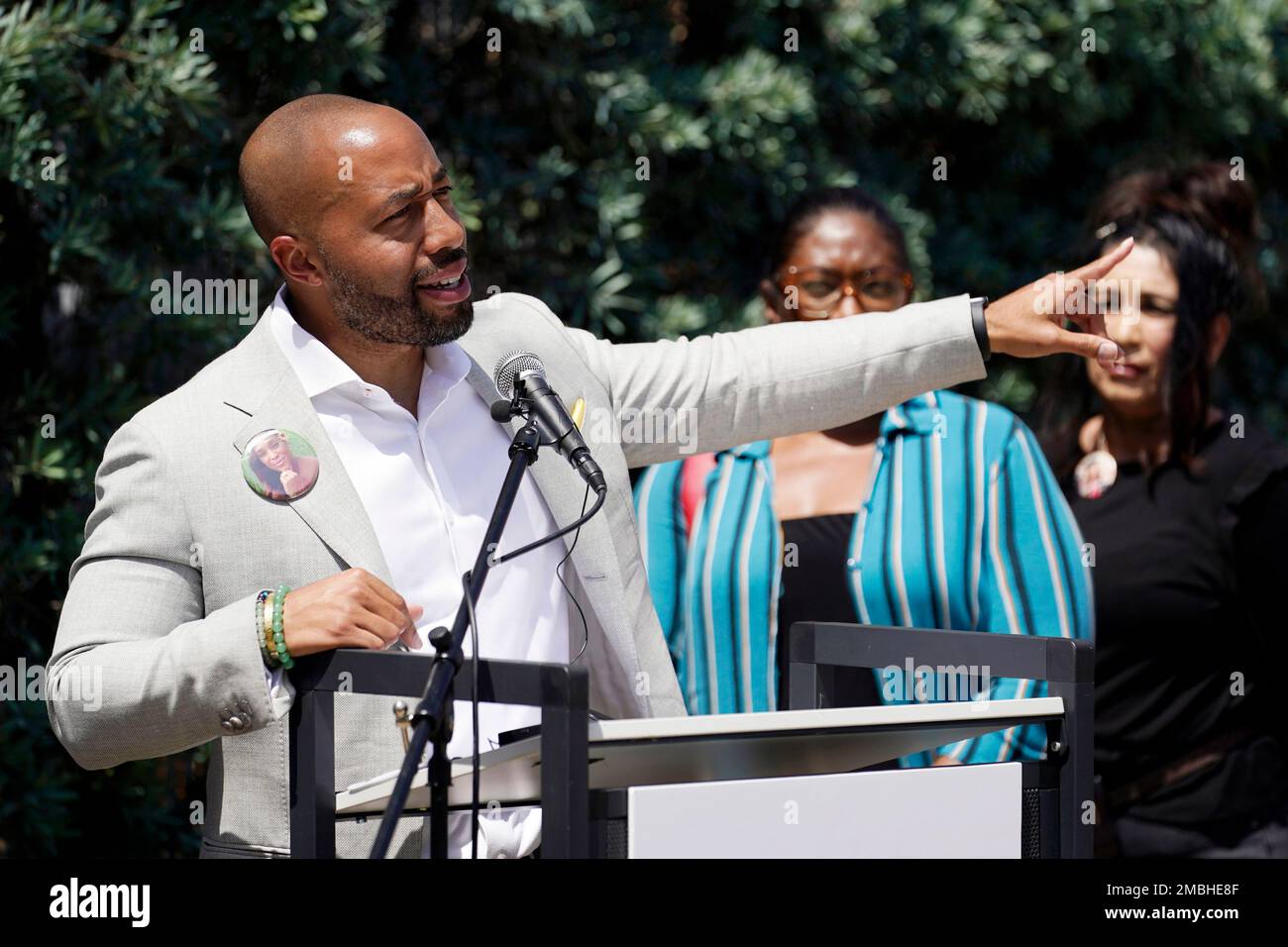 Charles Johnson speaks during a press conference announcing a lawsuit