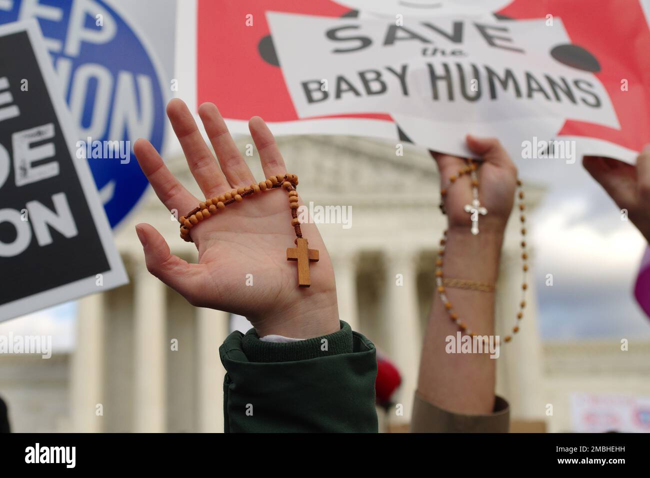Washington DC, USA. 20 Jan 2023. Pro-life protesters hold up signs and rosaries at the annual March for Life antiabortion demonstration, the first since Roe v. Wade was overturned in June 2022. Credit: Philip Yabut/Alamy Live News Stock Photo