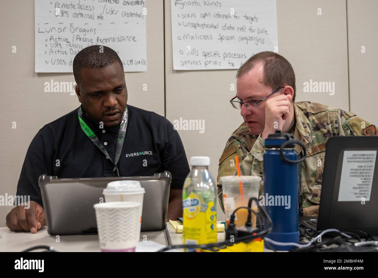 A cyber operations soldier and civilian utility company counterpart