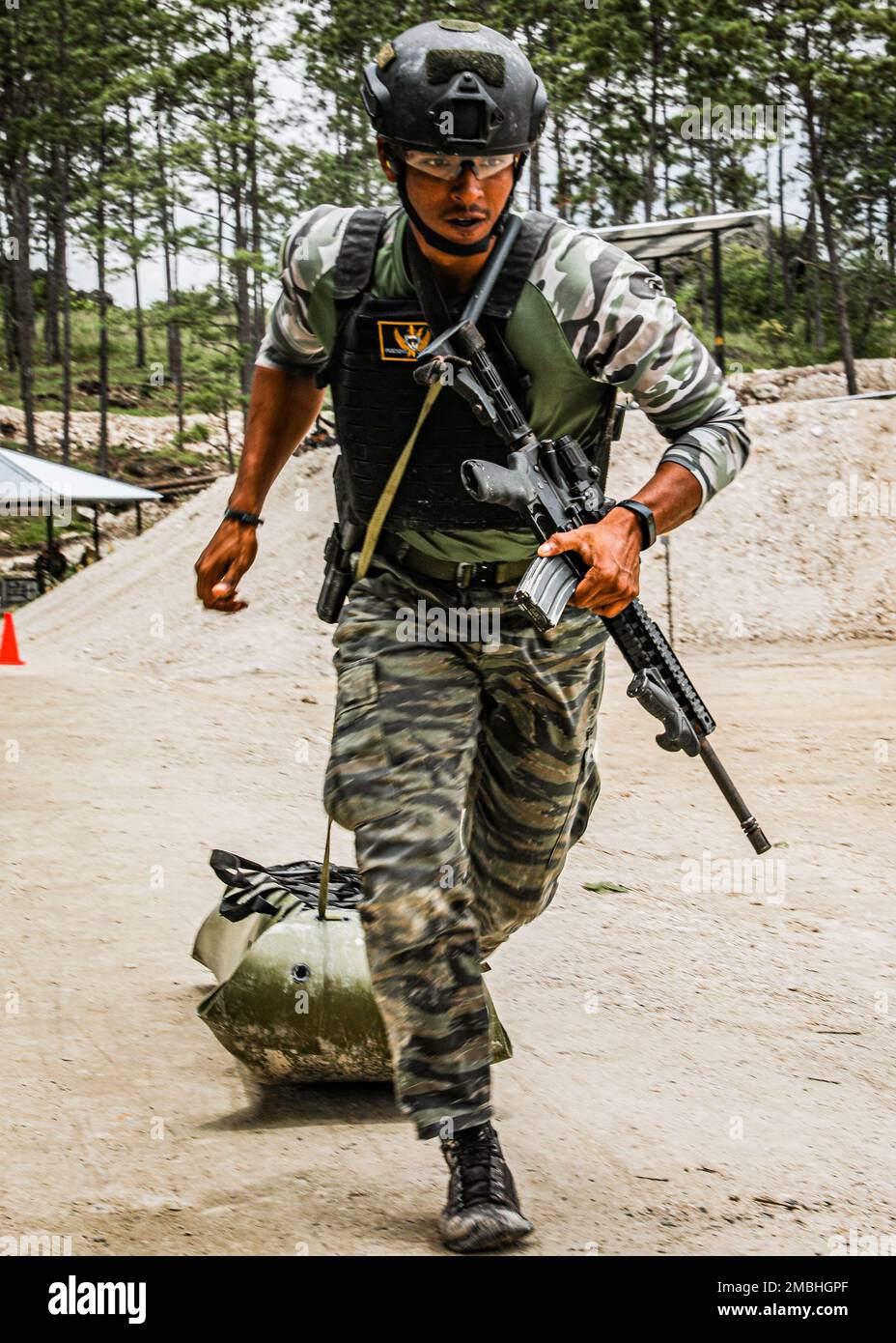 A Panamanian Soldier drags a sled during the assaulter stress test
