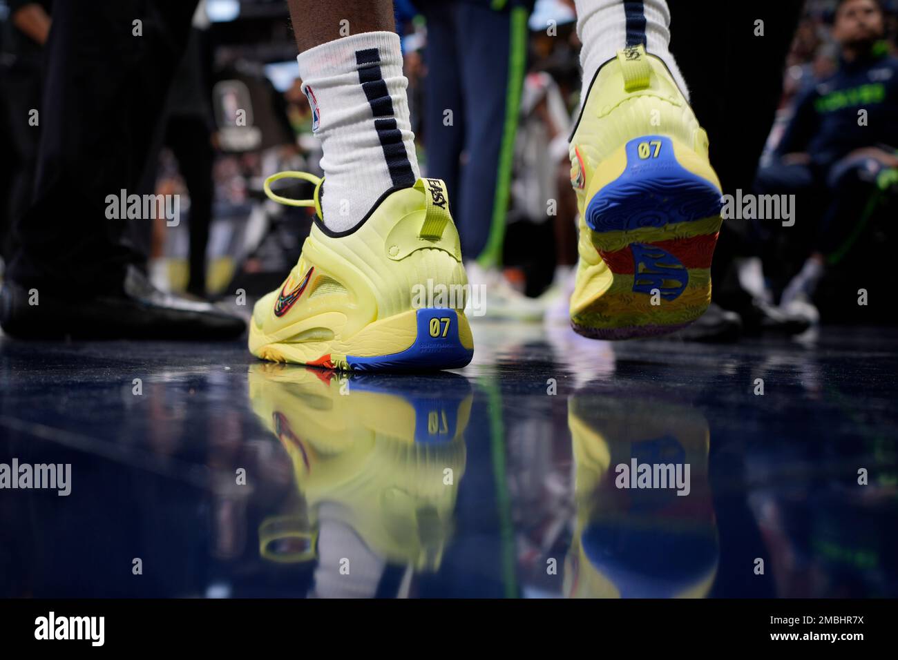 Minnesota Timberwolves forward Jaden McDaniels (3) wears Nike basketball  shoes in the first half of an NBA basketball game Wednesday, Jan. 18, 2023,  in Denver. (AP Photo/David Zalubowski Stock Photo - Alamy