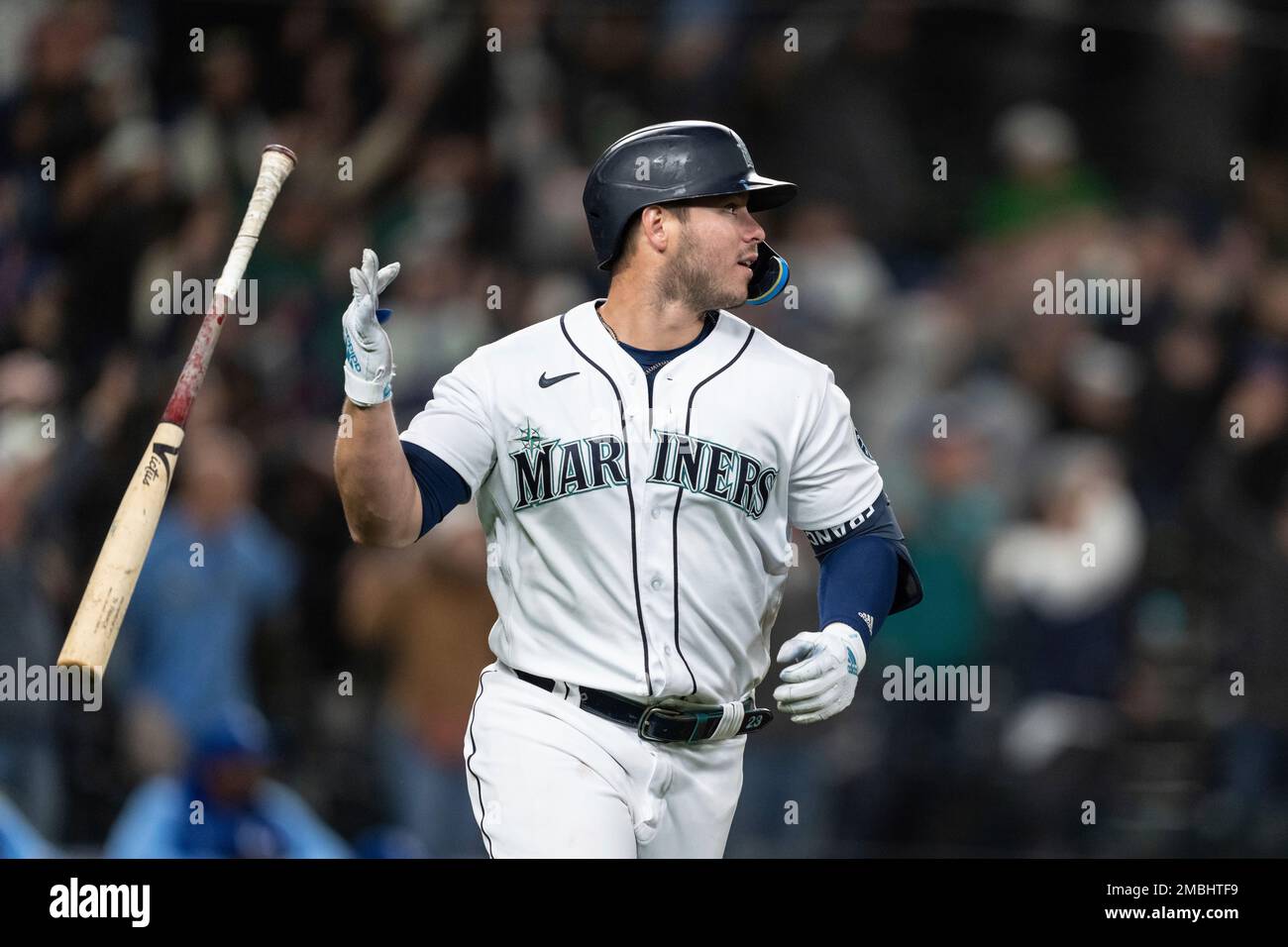 Seattle Mariners' Ty France flips his bat after hitting a home run