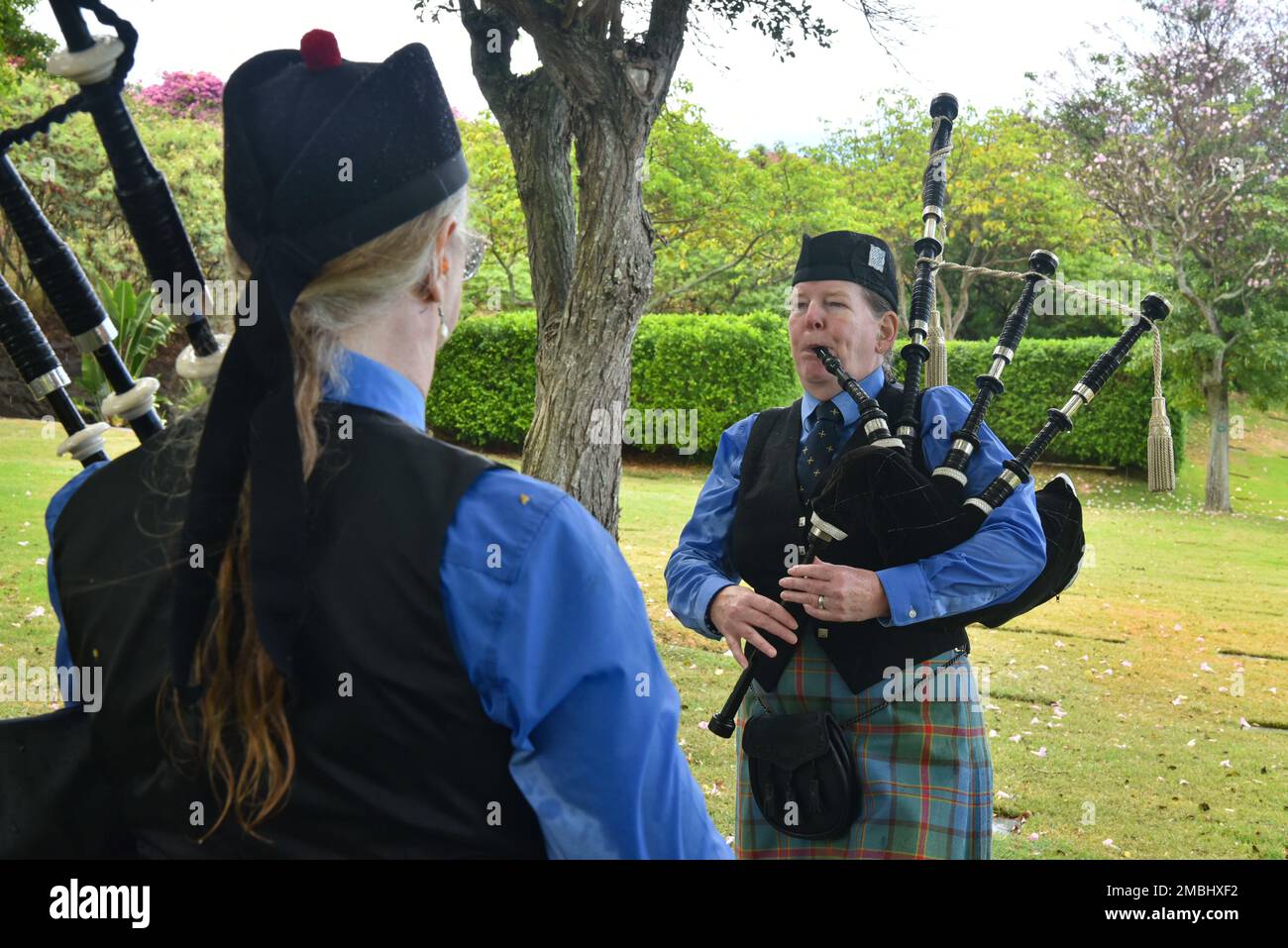 Two bagpipe players perform during an internment ceremony for U.S. Navy Machinist's Mate 2nd