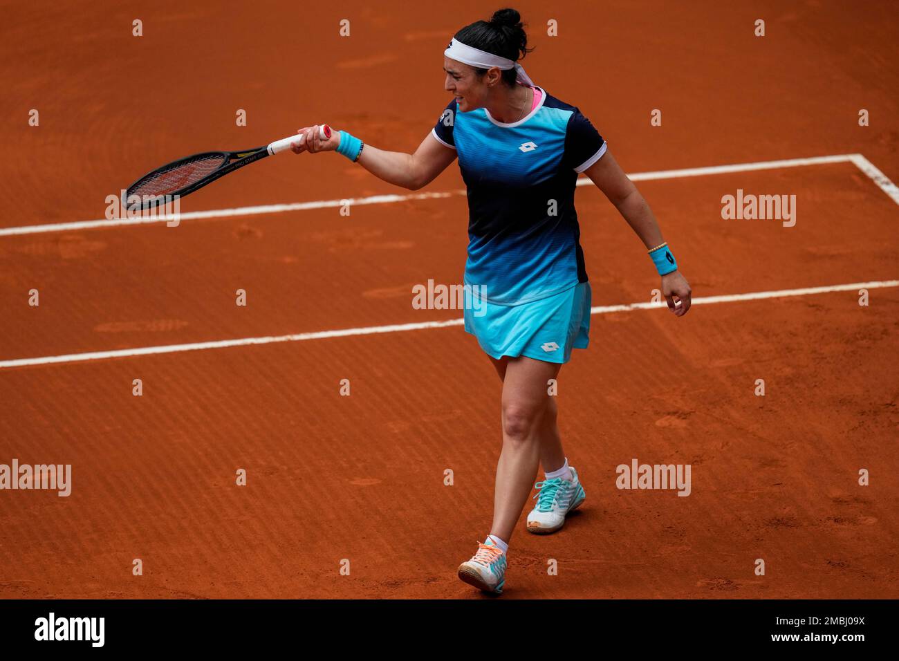 Ons Jabeur, of Tunisia, reacts during a match against Belinda Bencic, of  Switzerland, at the Mutua Madrid Open tennis tournament in Madrid, Monday,  May 2, 2022. (AP Photo/Bernat Armangue Stock Photo - Alamy