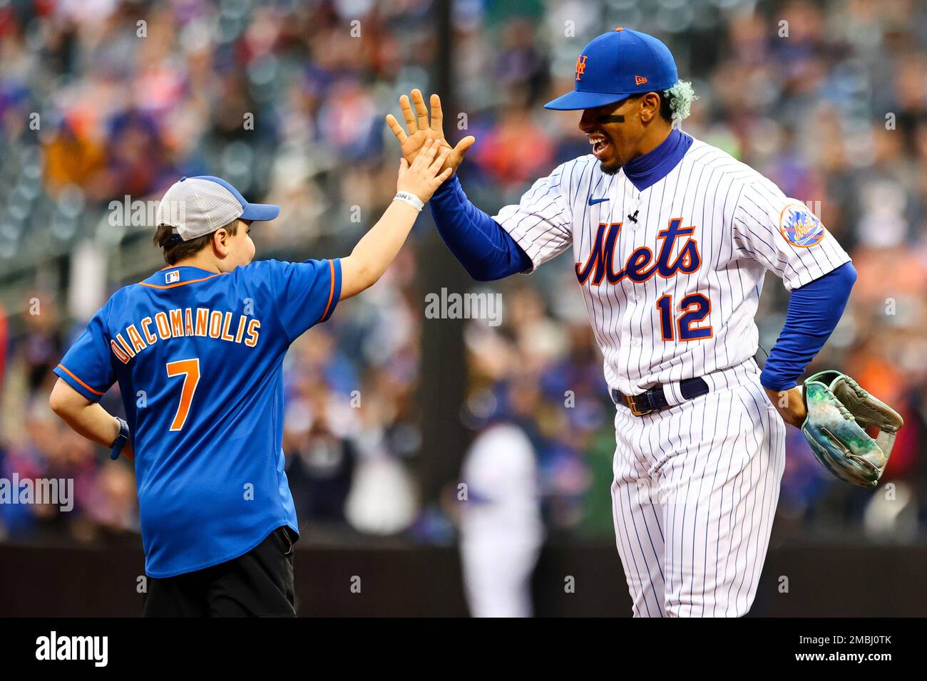 New York Mets shortstop Francisco Lindor (12) interacts with
