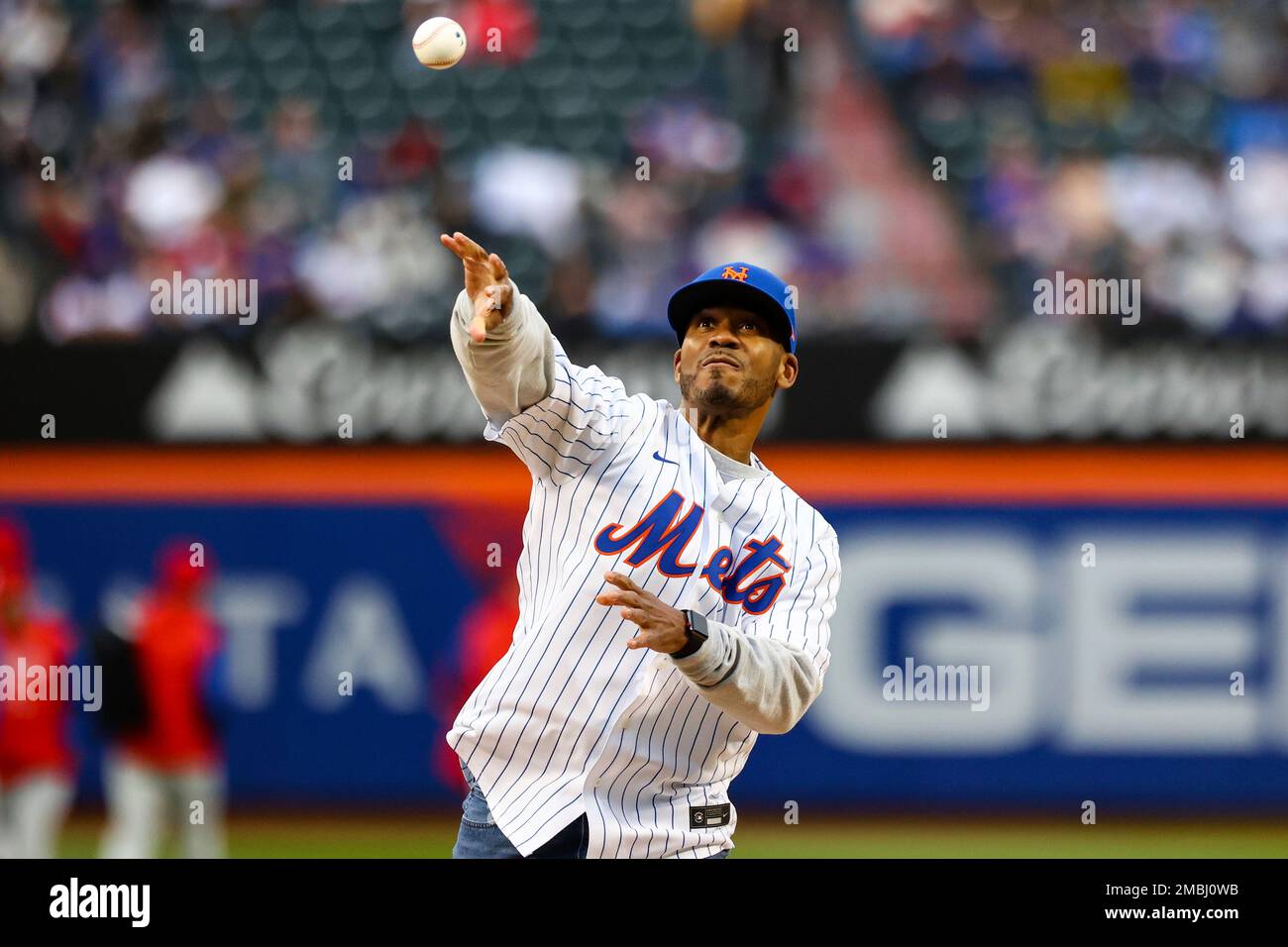 Seton Hall coach Shaheen Holloway throws out the first pitch before the  start of a baseball game against the Philadelphia Phillies, Sunday, May 1,  2022, in New York. (AP Photo/Jessie Alcheh Stock