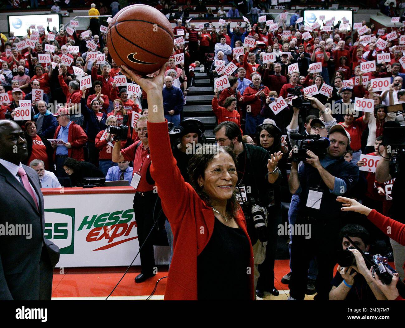 FILE - Rutgers head coach C. Vivian Stringer holds up a basketball as she  celebrates after her teams defeat of DePaul, 60-46, in a college basketball  game Wednesday, Feb. 27, 2008, in