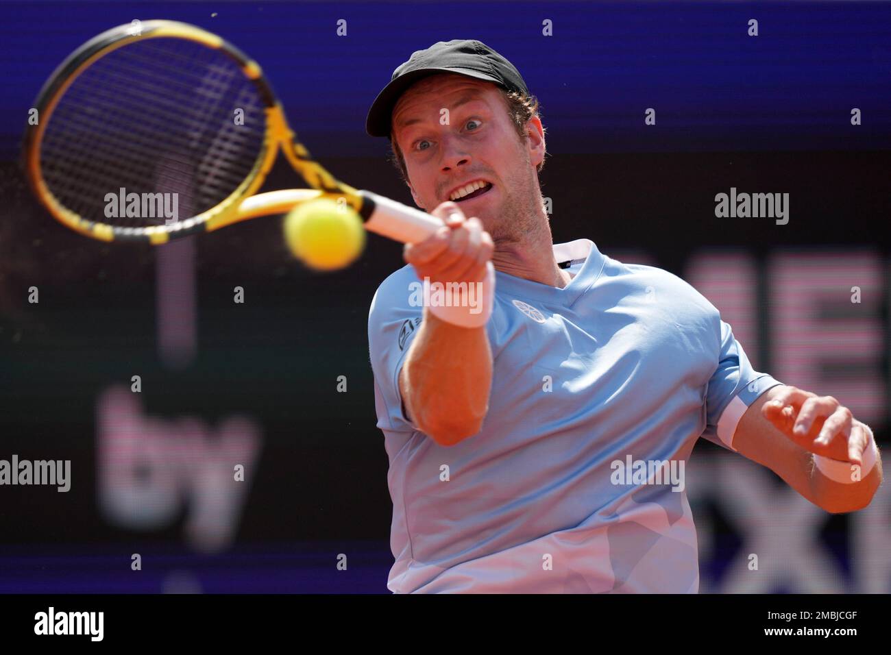Botic Van De Zandschulp of the Netherlands returns the ball during his quarterfinal match against Casper Ruud of Norway at the Tennis ATP tournament in Munich, Germany, Friday, April 29, 2022