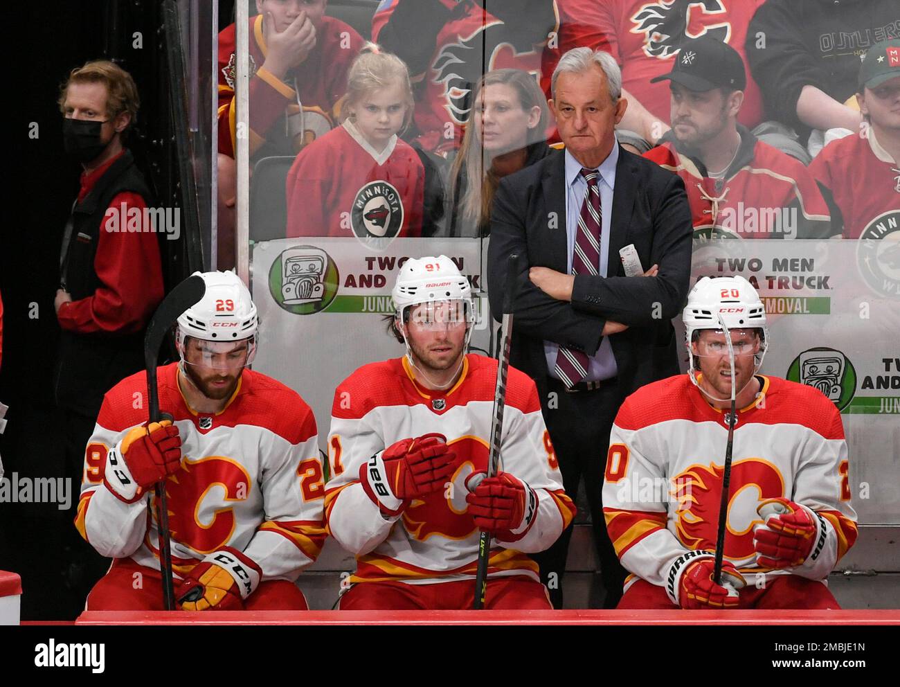 https://c8.alamy.com/comp/2MBJE1N/calgary-flames-coach-darryl-sutter-stands-behind-dillon-dube-calle-jarnkrok-and-blake-coleman-from-left-as-he-watches-during-the-first-period-of-an-nhl-hockey-game-against-the-minnesota-wild-on-thursday-april-28-2022-in-st-paul-minn-the-wild-won-3-2-in-overtime-ap-photocraig-lassig-2MBJE1N.jpg