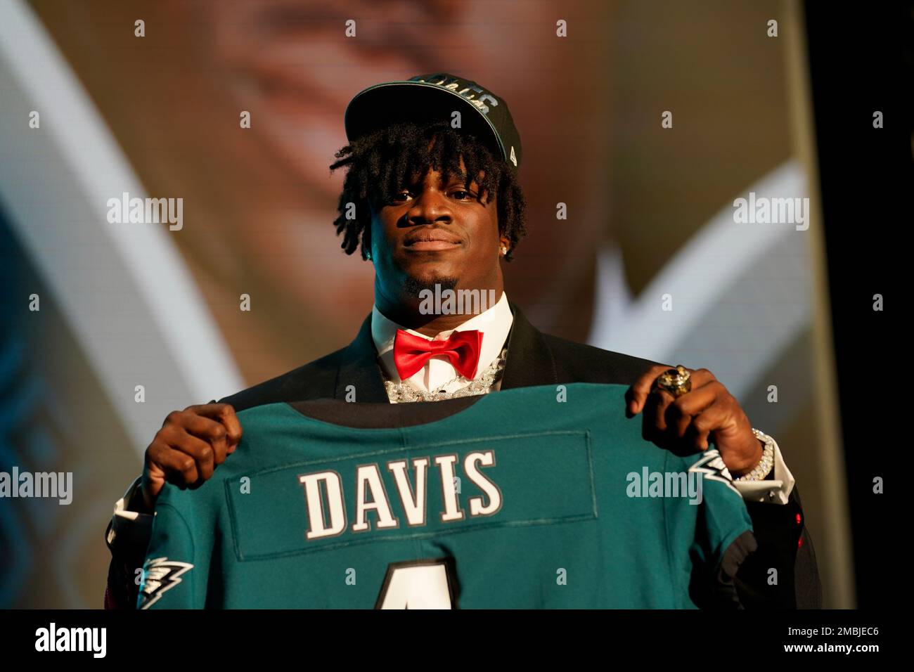 Georgia defensive tackle Jordan Davis holds a jersey after being chosen by  the Philadelphia Eagles with the 13th pick of the NFL football draft  Thursday, April 28, 2022, in Las Vegas. (AP