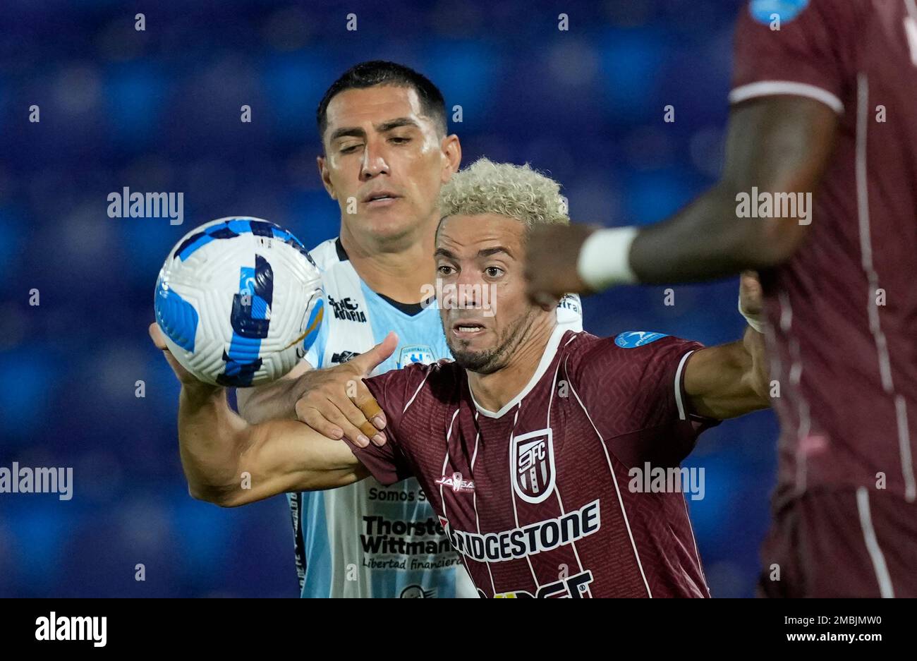 Aquilino Gimenez of Paraguay's Guairena FC, left, and Jaen Pineda