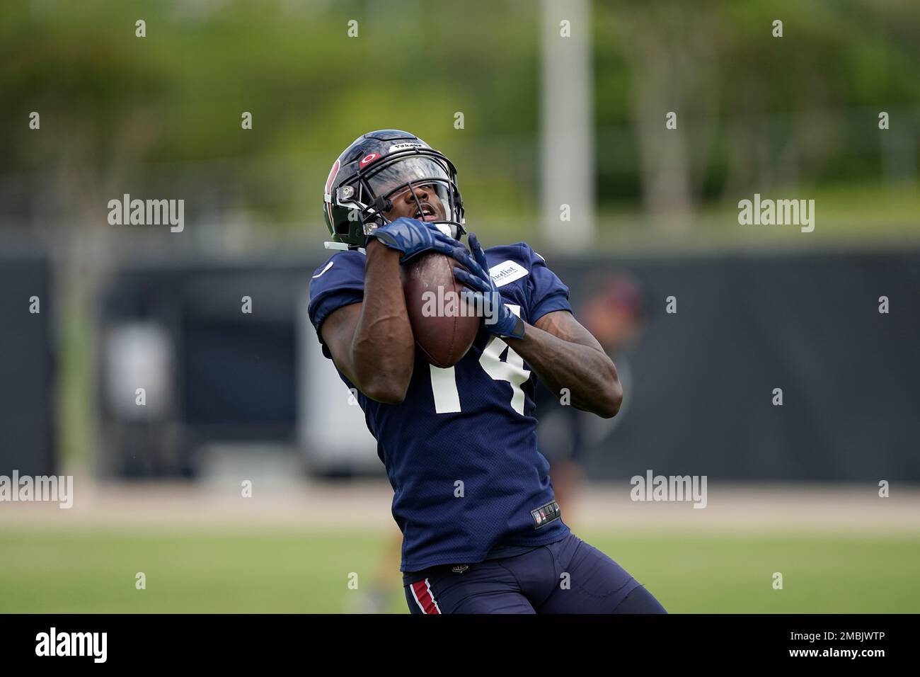 Houston Texans wide receiver Davion Davis catches a pass during an NFL  football minicamp practice Tuesday, June 14, 2022, in Houston. (AP  Photo/David J. Phillip Stock Photo - Alamy