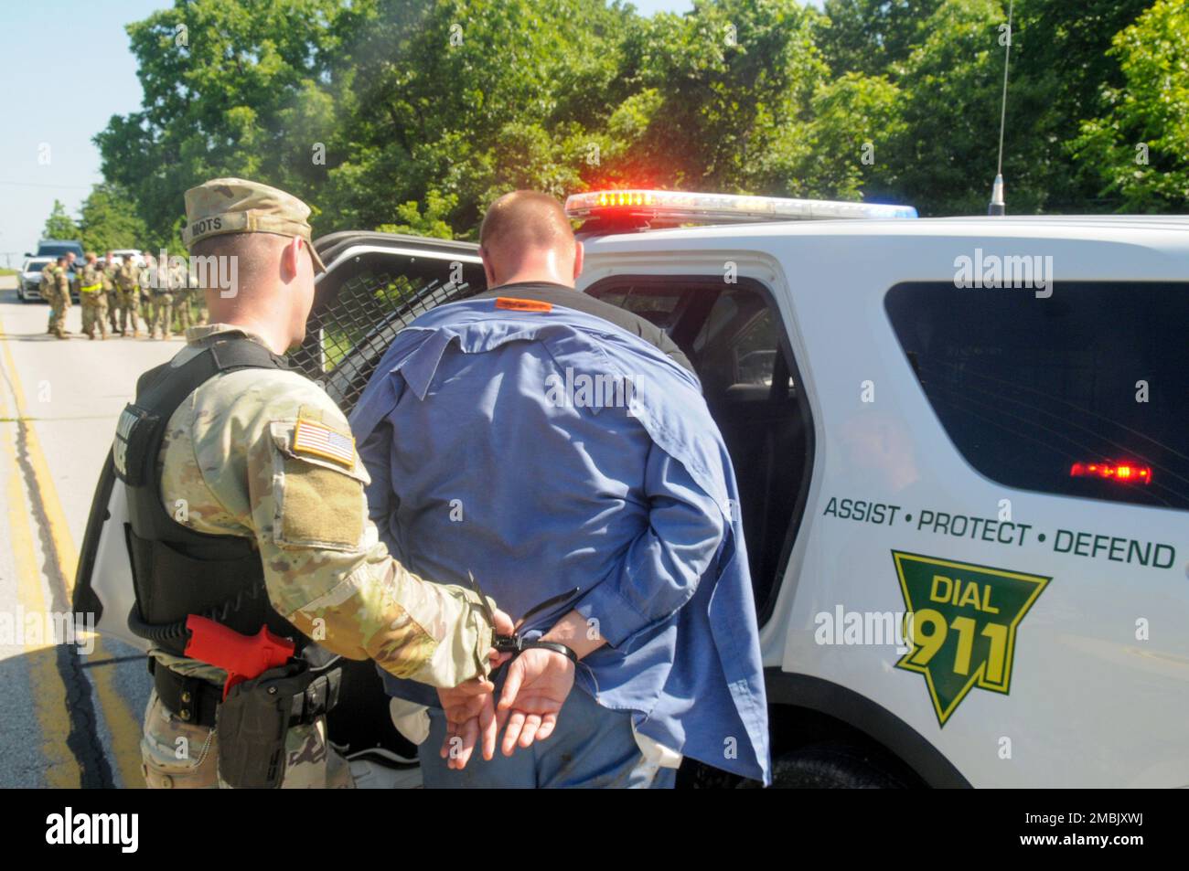 Sgt. 1st Class Jon Ours, an operation noncommissioned officer with the 15th Military Police Brigade, is apprehended, marking the end of the escaped inmate exercise conducted by the 15th MP Brigade.  Ours played one of two suspects to 'escape' from the U.S. Disciplinary Barracks. Stock Photo