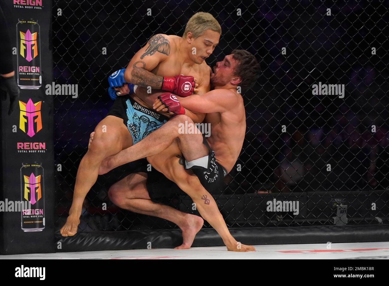 Tyson Siphavong-Miller, left, fights Rhalan Gracie during a welterweight fight at the Bellator 277 mixed martial arts event in San Jose, Calif., Friday, April 15, 2022