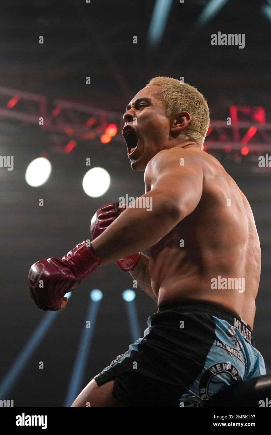 Tyson Siphavong-Miller celebrates after defeating Rhalan Gracie during a welterweight fight at the Bellator 277 mixed martial arts event in San Jose, Calif., Friday, April 15, 2022