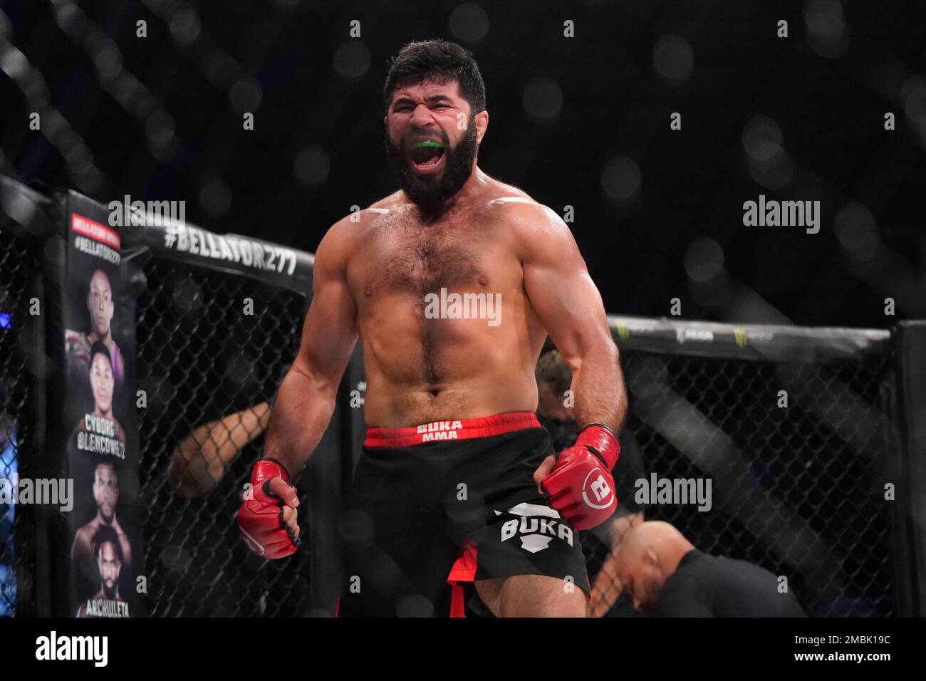 Dovletdzhan Yagshimuradov celebrates after defeating Rafael Carvalho during a light heavyweight bout at the Bellator 277 mixed martial arts event in San Jose, Calif., Friday, April 15, 2022