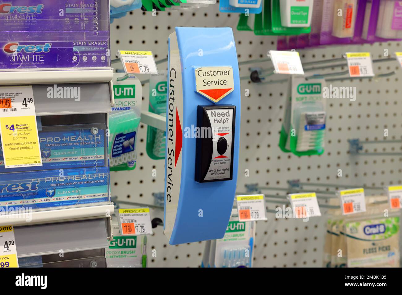 A wireless customer service call button at a Duane Reade drugstore. The button alerts workers to a customer requesting help in obtaining items from lo Stock Photo