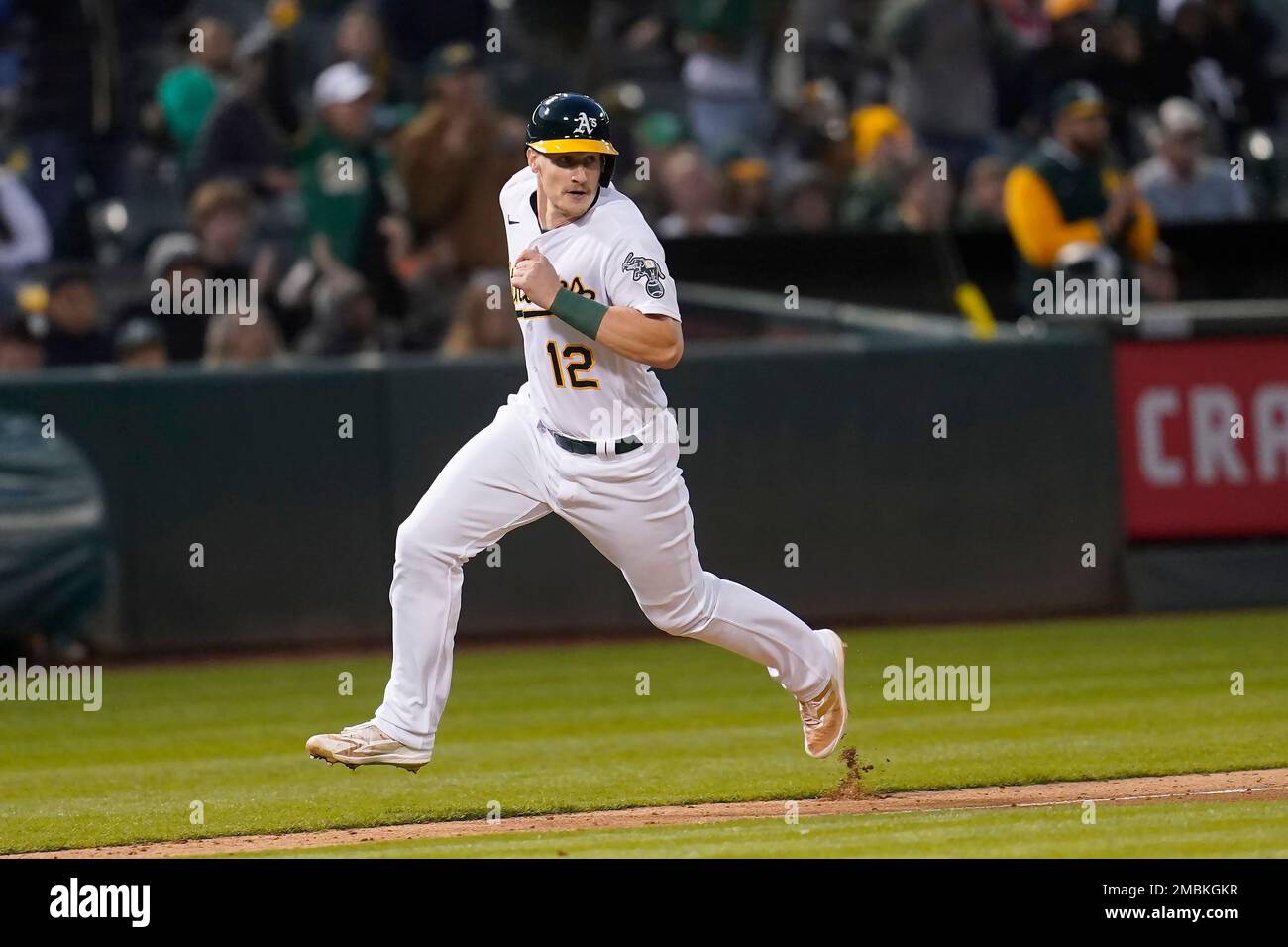 Oakland Athletics' Sean Murphy runs home to score against the Texas