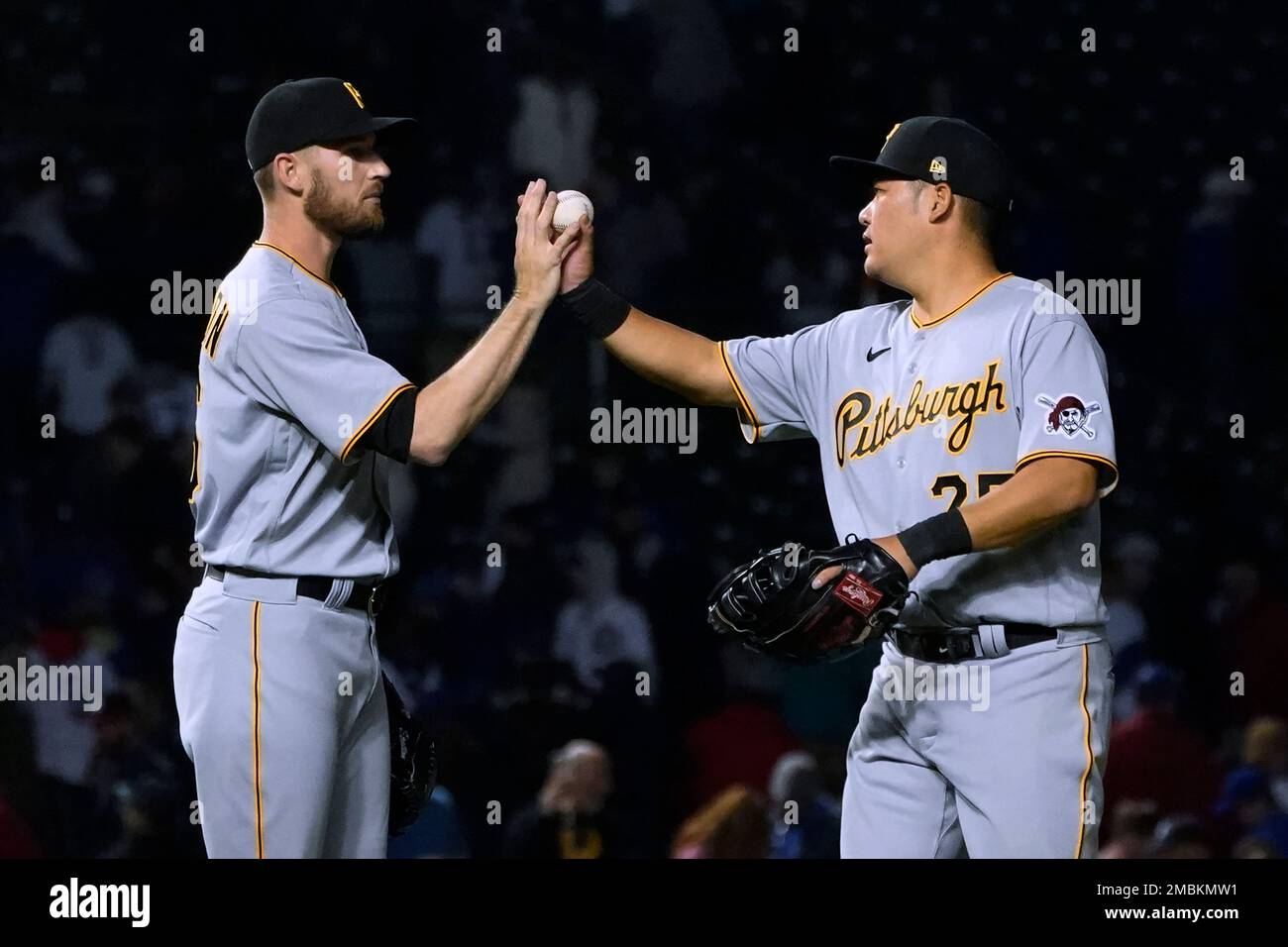 Pittsburgh Pirates relief pitcher Chris Stratton, left, and first ...
