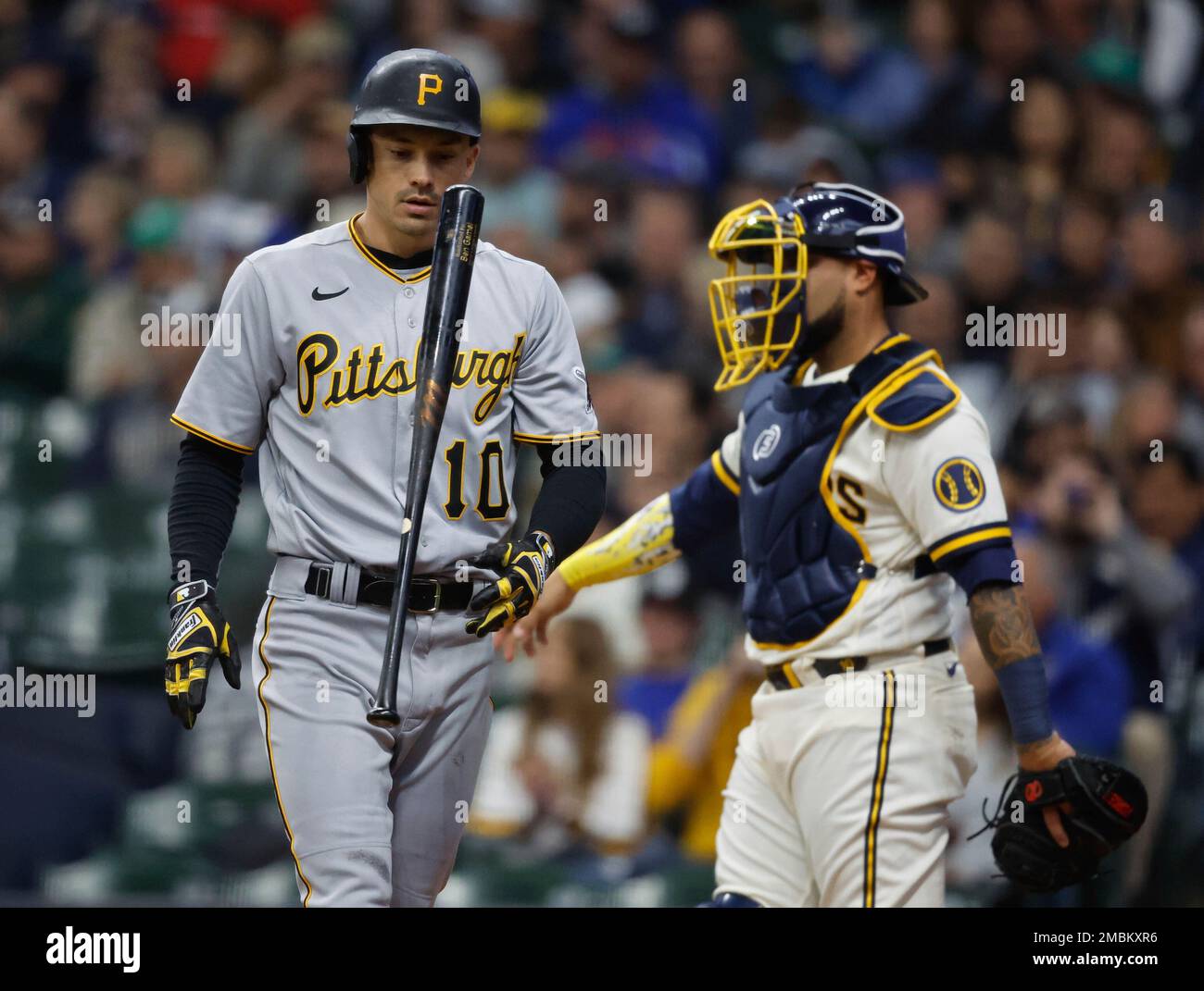 Pittsburgh Pirates left fielder Bryan Reynolds (10) flips his bat after  striking out against the Milwaukee Brewers during the sixth inning of a  baseball game Wednesday, April 20, 2022, in Milwaukee. (AP