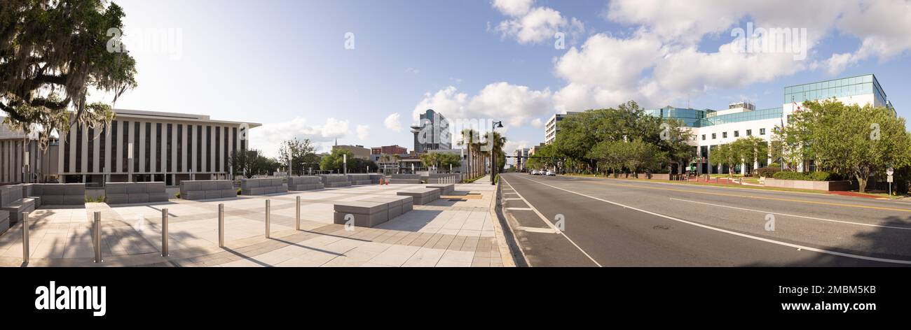 Tallahassee, Florida, USA - April 18, 2022: Downtown as seen on Monroe Street with the Leon County Courthouse to the right and the Florida House Build Stock Photo