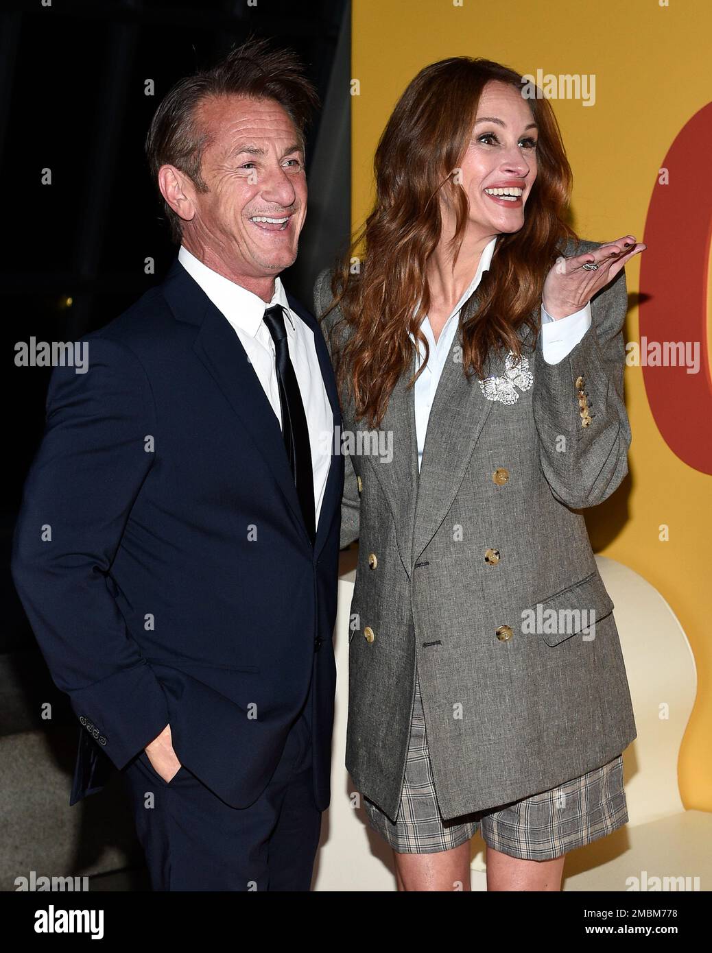 Actors Sean Penn, left, and Julia Roberts pose together at the premiere