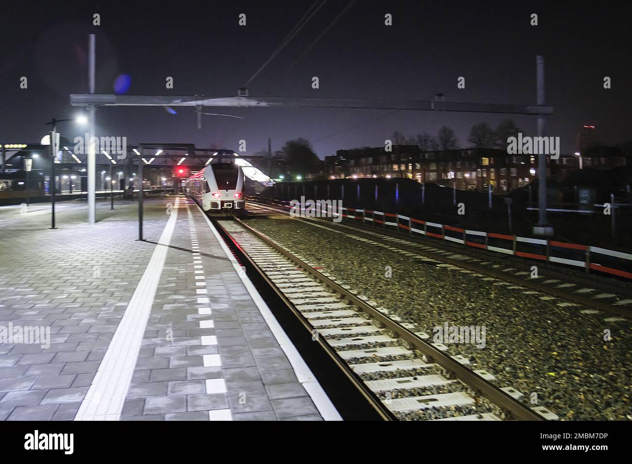 GRONINGEN - The first night train Arriva night train at Groningen station.  The night train will run from Groningen to Schiphol and back every Friday  night. Photo: the train leaves exactly at