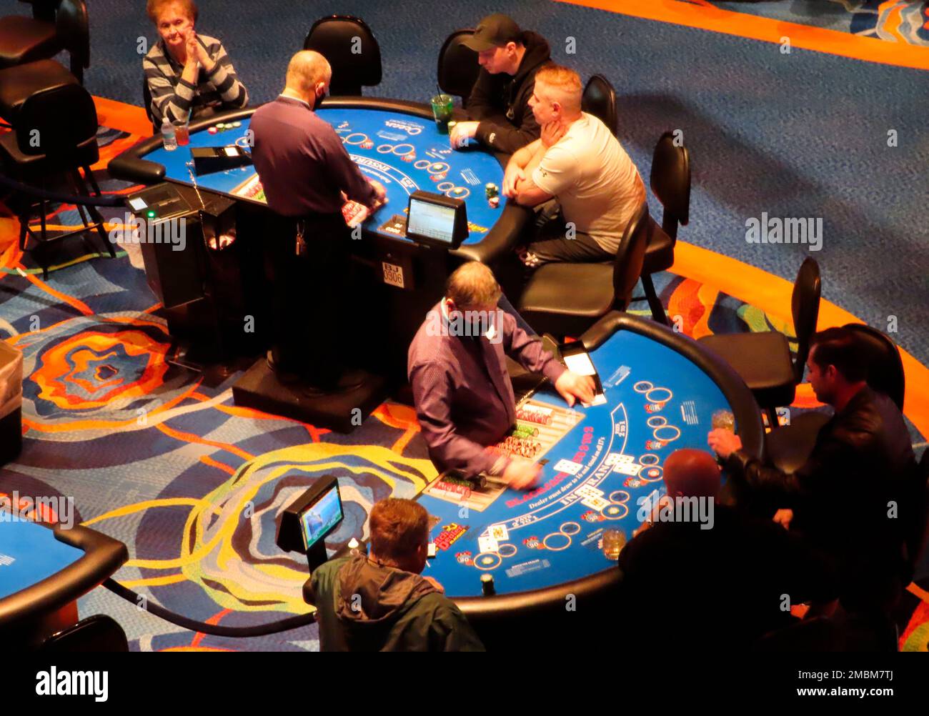 Dealers conduct games of blackjack at the Ocean Casino Resort in Atlantic  City, N.J., Feb. 10, 2022. Figures released by New Jersey gambling  regulators on April 18, 2022, show seven of Atlantic